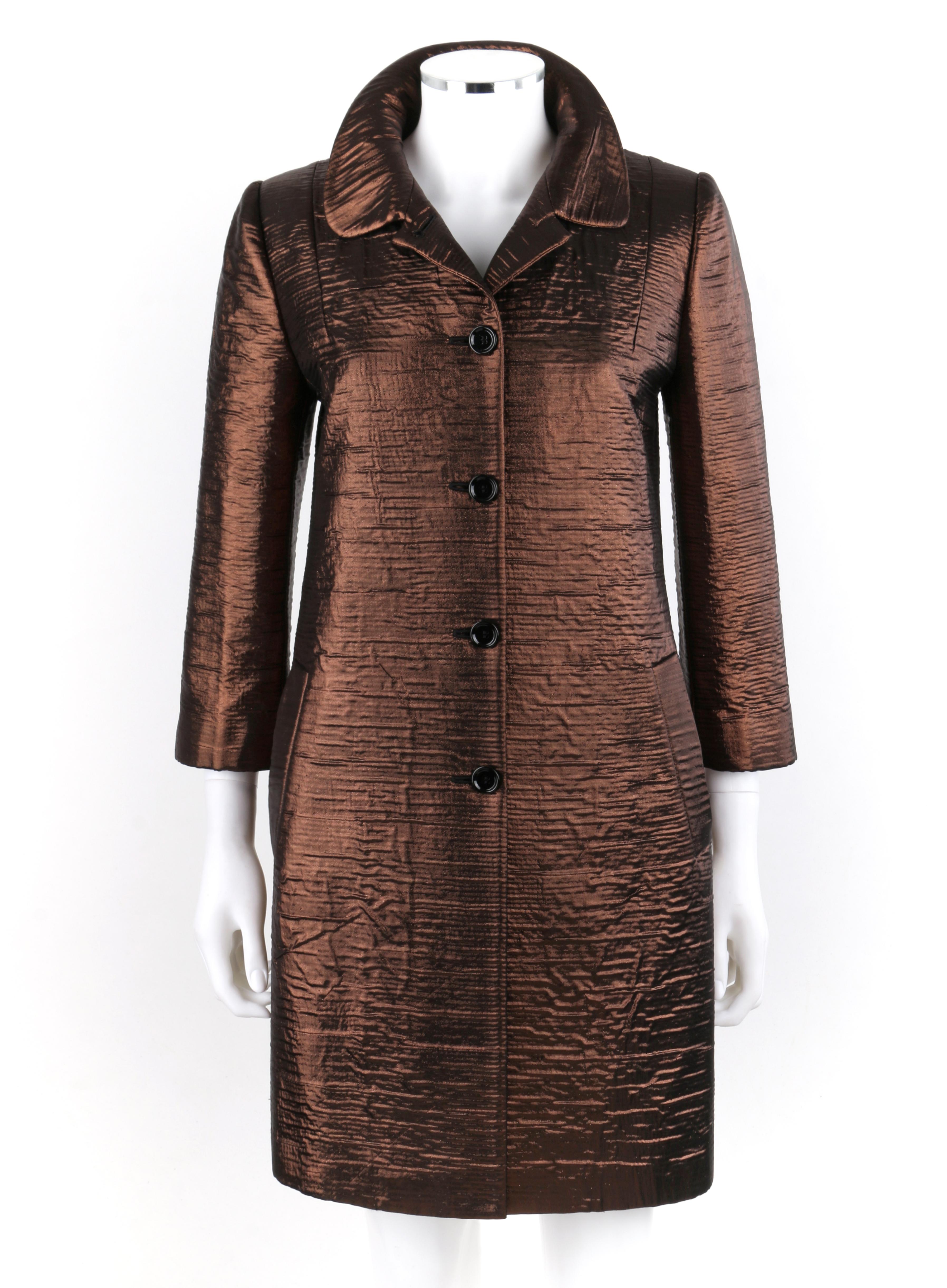 DOLCE & GABBANA c.2010’s Dark Bronze Metallic Silk Car Coat 3/4 Sleeve Jacket 
 
Brand / Manufacturer: Dolce & Gabbana
Style: Car Coat
Color(s): shades of dark bronze, black
Lined: Yes      
Marked Fabric Content: 65% Wool; 19% Silk; 10% Polyester;