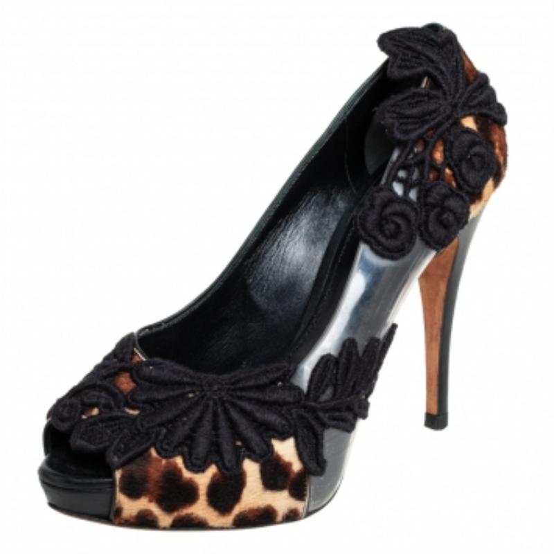 Stunning with an elegant feminine style, these Dolce & Gabbana pumps are perfect for a host of ensembles. They are crafted from leopard printed calf hair and PVC and are adorned with beautiful floral embroidery. They are finished with platforms,