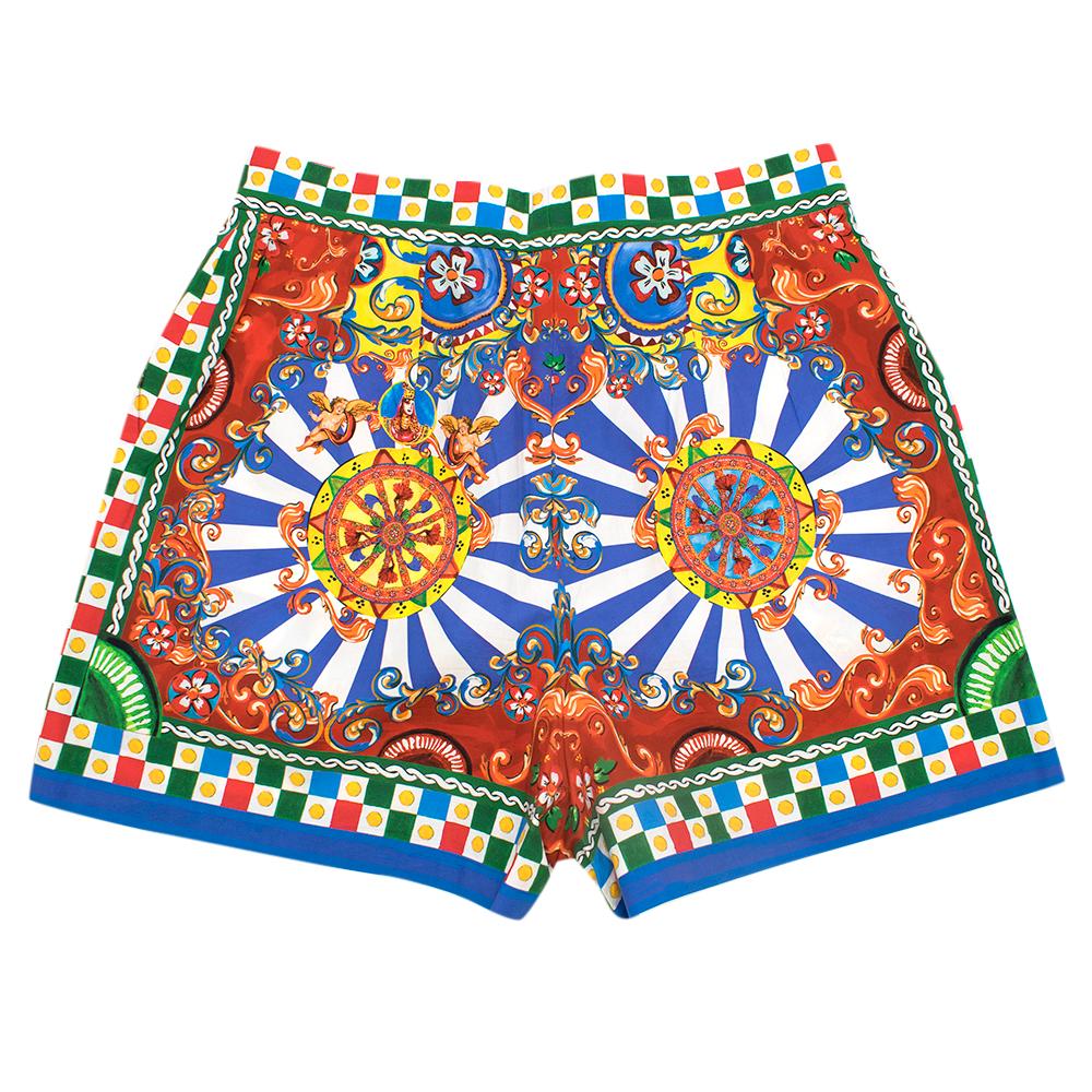 Dolce & Gabbana Carretto Printed Shorts

Cotton multi-coloured shorts
Decorative wheel pattern print 
High waisted 
Enamelled daisy closure 
Snap and concealed zip fastening 
Two front slanted pockets 


Please note, these items are pre-owned and