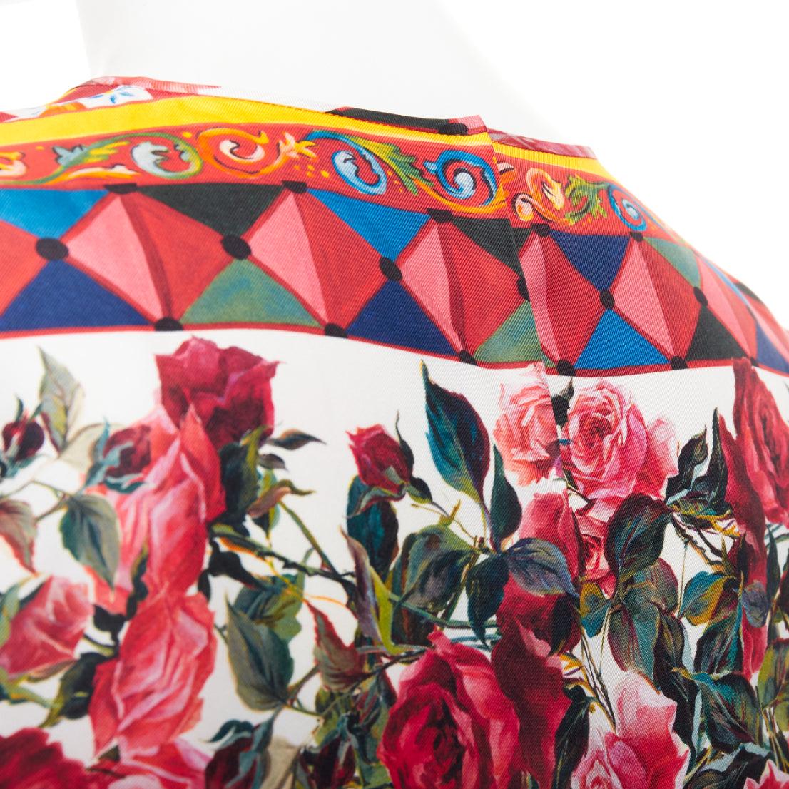 DOLCE GABBANA  Carretto Roses pink multicolor print silk crew top IT38 XS
Reference: MECG/A00189
Brand: Dolce Gabbana
Designer: Domenico Dolce and Stefano Gabbana
Material: Silk
Color: Pink, Multicolour
Pattern: Floral
Closure: Keyhole Button
Made