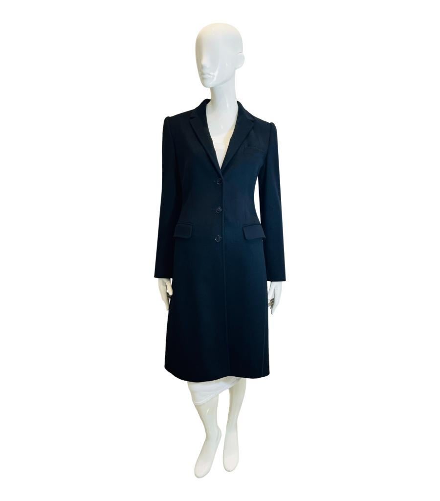 Dolce & Gabbana Cashmere & Wool Coat
Timeless black coat crafted from cashmere and wool, styled with single-breasted design and knee length.
Featuring notched lapels, flap pockets to the front and centre button closure.
Size – 42IT
Condition – Very
