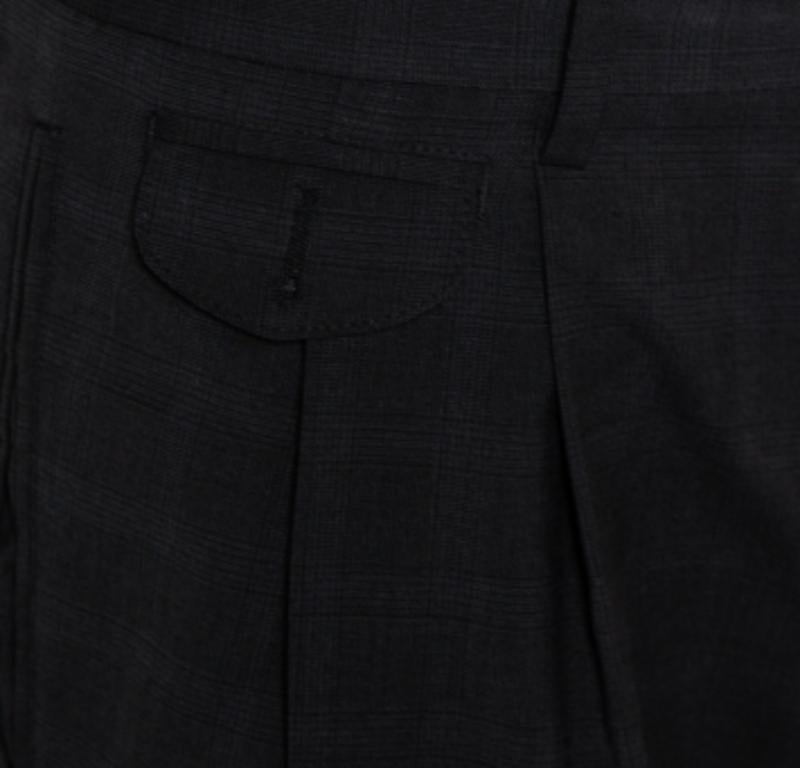 Dolce & Gabbana's smart and refined designs make the brand a great choice when looking for stylish clothing. These checkered formal pants have a tapered silhouette that gives you a neat look and a comfortable fit. The pair will be a loved addition.