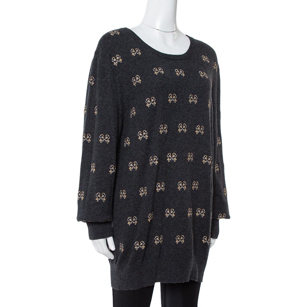 Plush and warm, this sweater by Dolce & Gabbana is made from cashmere. It is styled with long sleeves and keys embroidered all over. Nail a super stylish look with ease by pairing this creation with jeans and boots.

