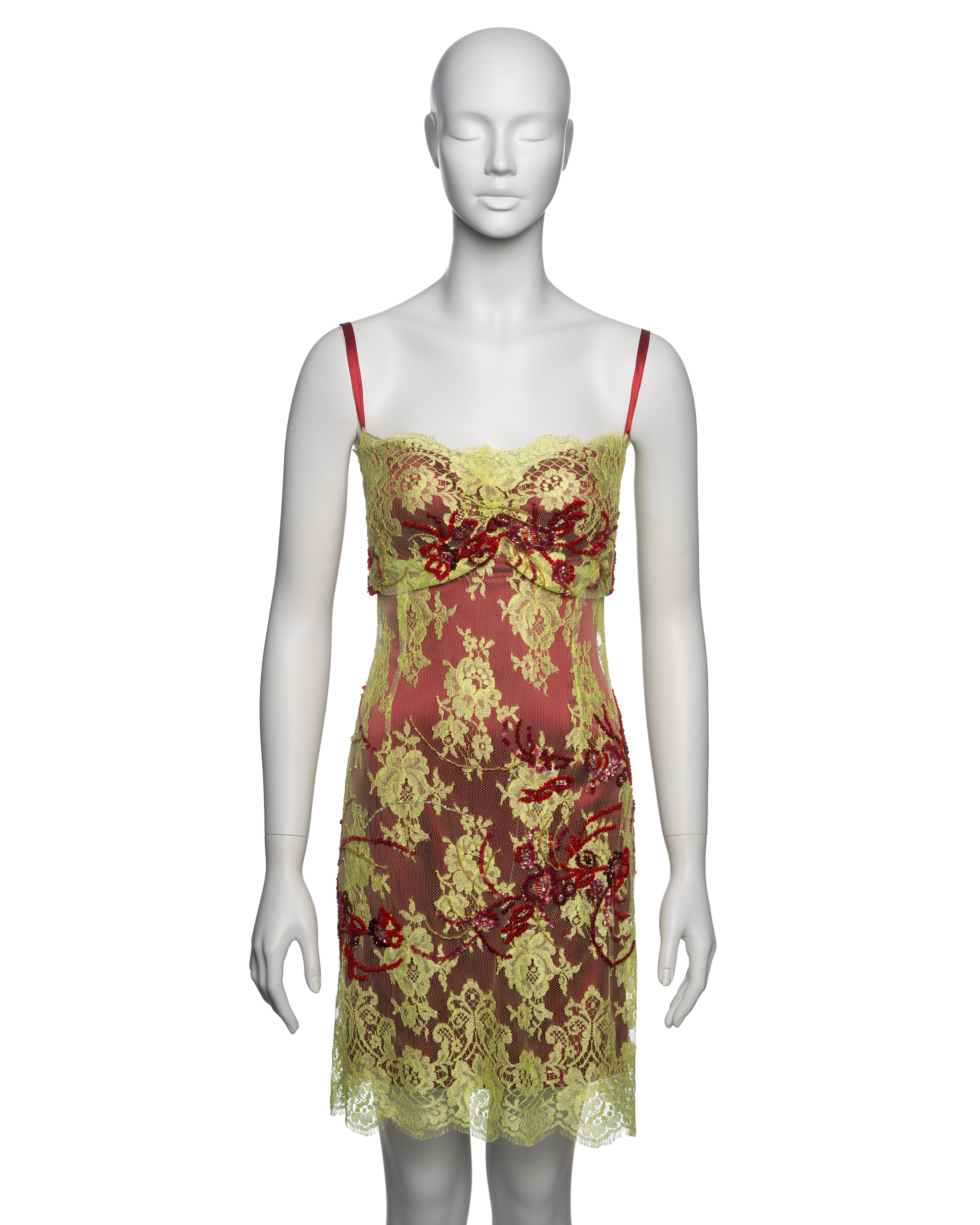 ▪ Brand: Dolce & Gabbana
▪ Creative Director: Domenico Dolce and Stefano Gabbana
▪ Collection: Fall-Winter 1999
▪ Fabric: Chartreuse Chantilly lace, crimson red stretch silk satin 
▪ Details: Featuring intricate botanical bead embroidery, this dress
