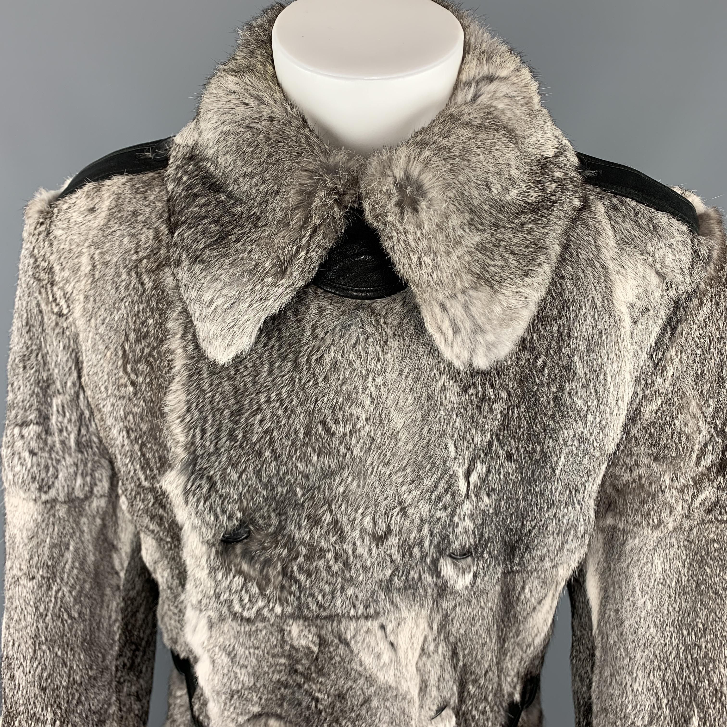 DOLCE & GABANNA Long Fur Coat comes in gray tones in a rabbit fur material, with a buttoned collar, double breasted, slit pockets, black leather belt and trim, belted cuffs, and a single and buttoned vent at back. Made in Italy.  Retails for