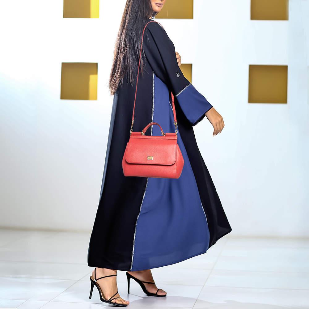 Designer bags are ideal companions for ample occasions Here we have a fashion meets functionality piece crafted with precision. It has been equipped with a well sized interior that can easily fit your small essentials.