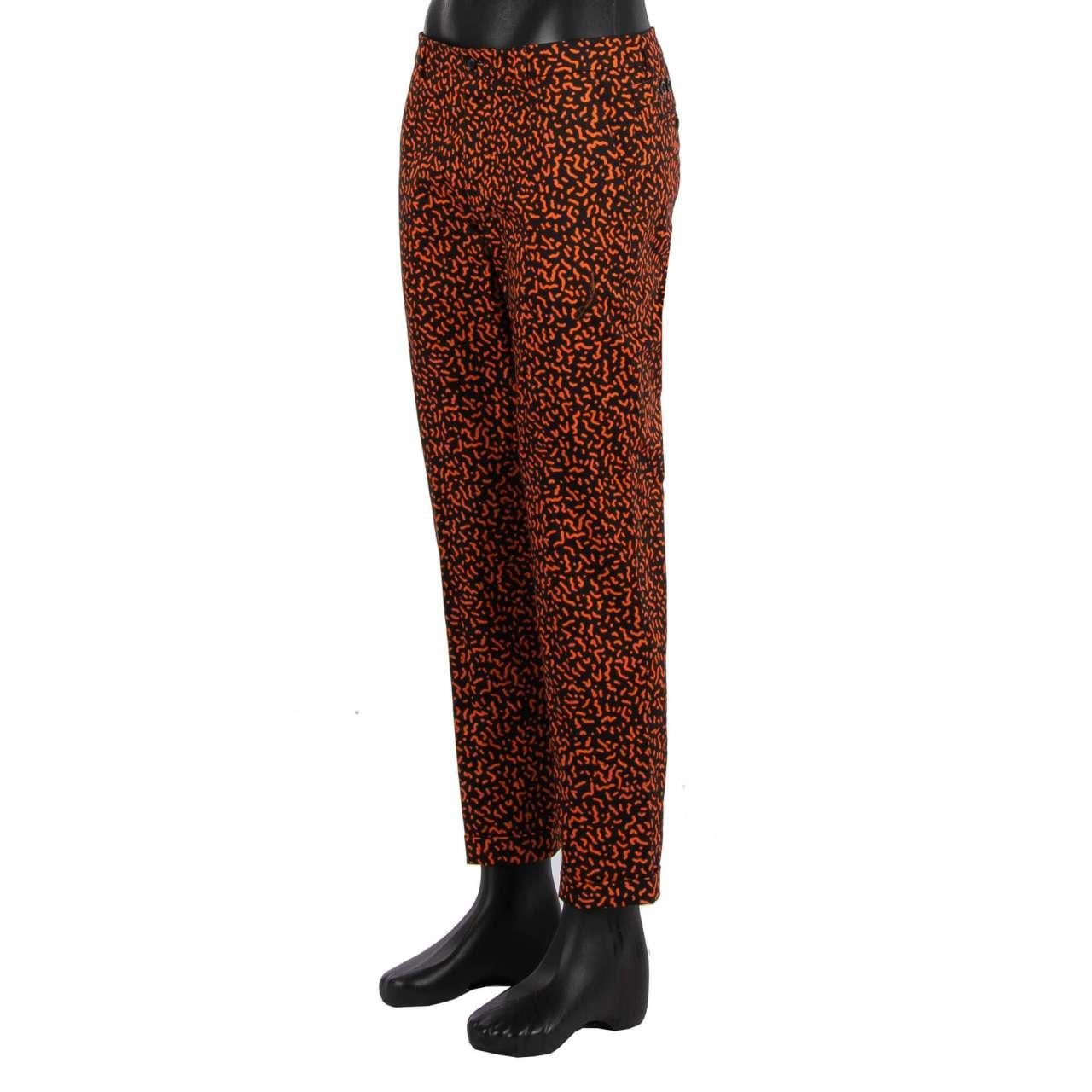 - Classic / Dress Cotton Trousers with print by DOLCE & GABBANA - New with tag - MADE IN ITALY - Former RRP: EUR 695 - Tailored F- Model: GY6IET-FSFGO-HNFFO - Material: 97% Cotton, 3% Elastan - Color: Black / Orange - 4 pockets - Adjustable waist