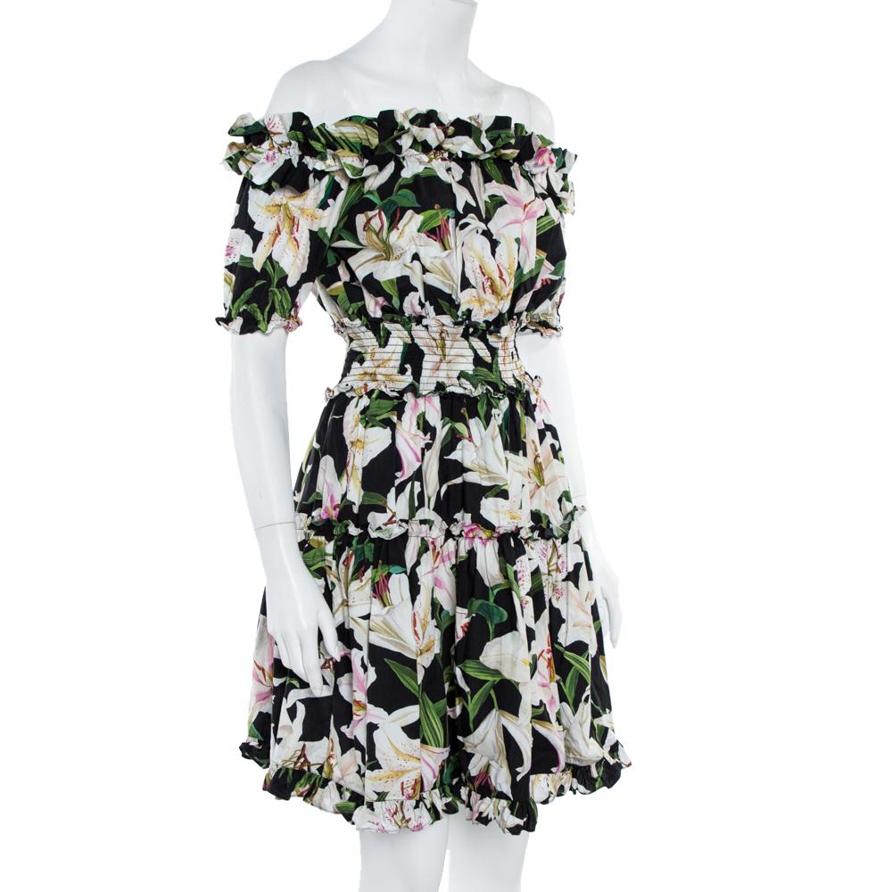 Dolce & Gabbana's floral prints embody classic Italian glamour, and this dress is a sublime example. It's shaped for a relaxed fit with an off-the-shoulder neckline trimmed with a coordinating ruffle. It then flares out into a tiered skirt from an