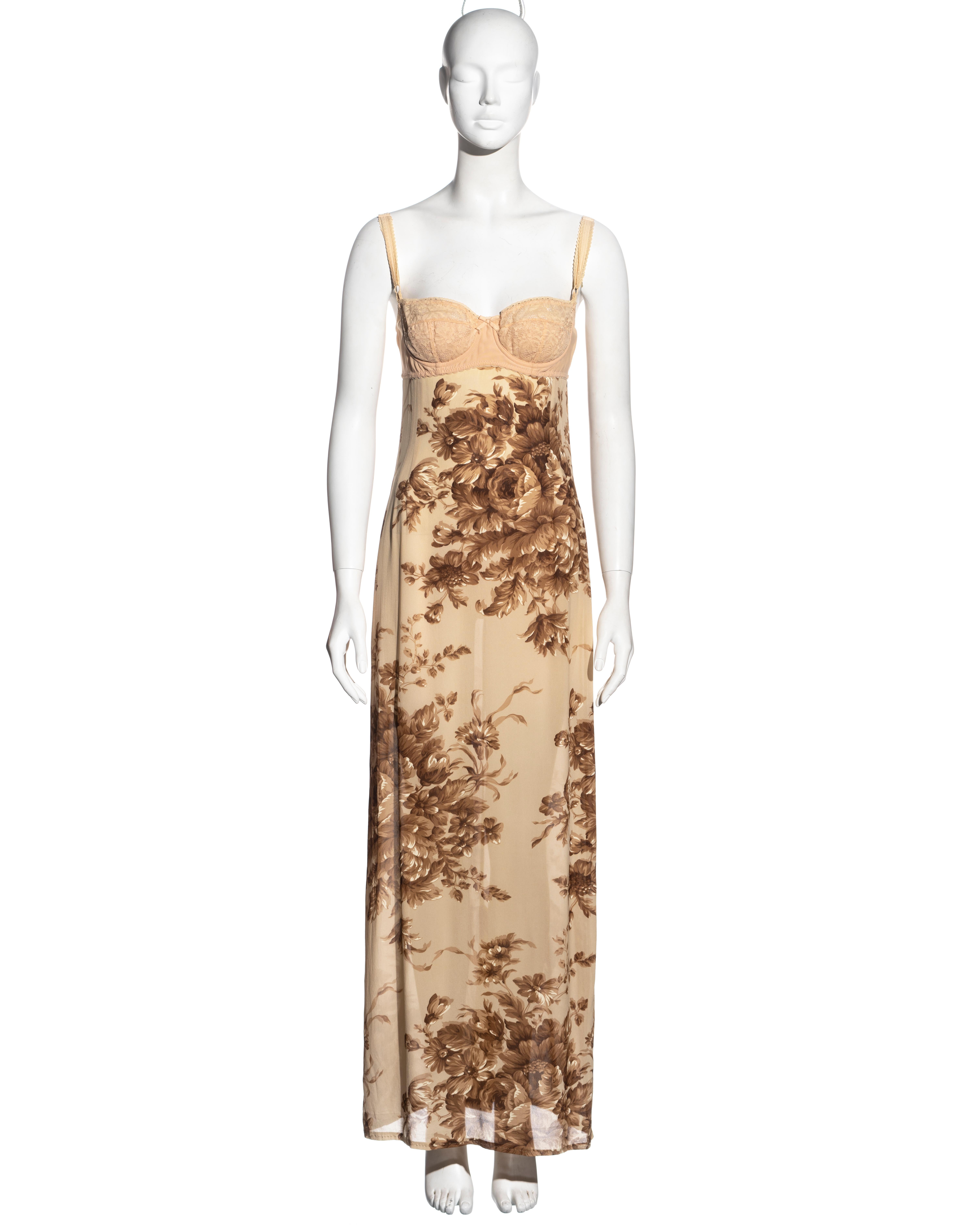 ▪ Vintage Dolce & Gabbana slip dress 
▪ Cream and brown floral silk 
▪ Integrated lace and spandex bra with adjustable shoulder straps 
▪ String ties fasten at the back 
▪ Maxi length 
▪ IT 40 - FR 36 - UK 8
▪ Spring-Summer 1997
▪ 96% Silk, 4% Lycra