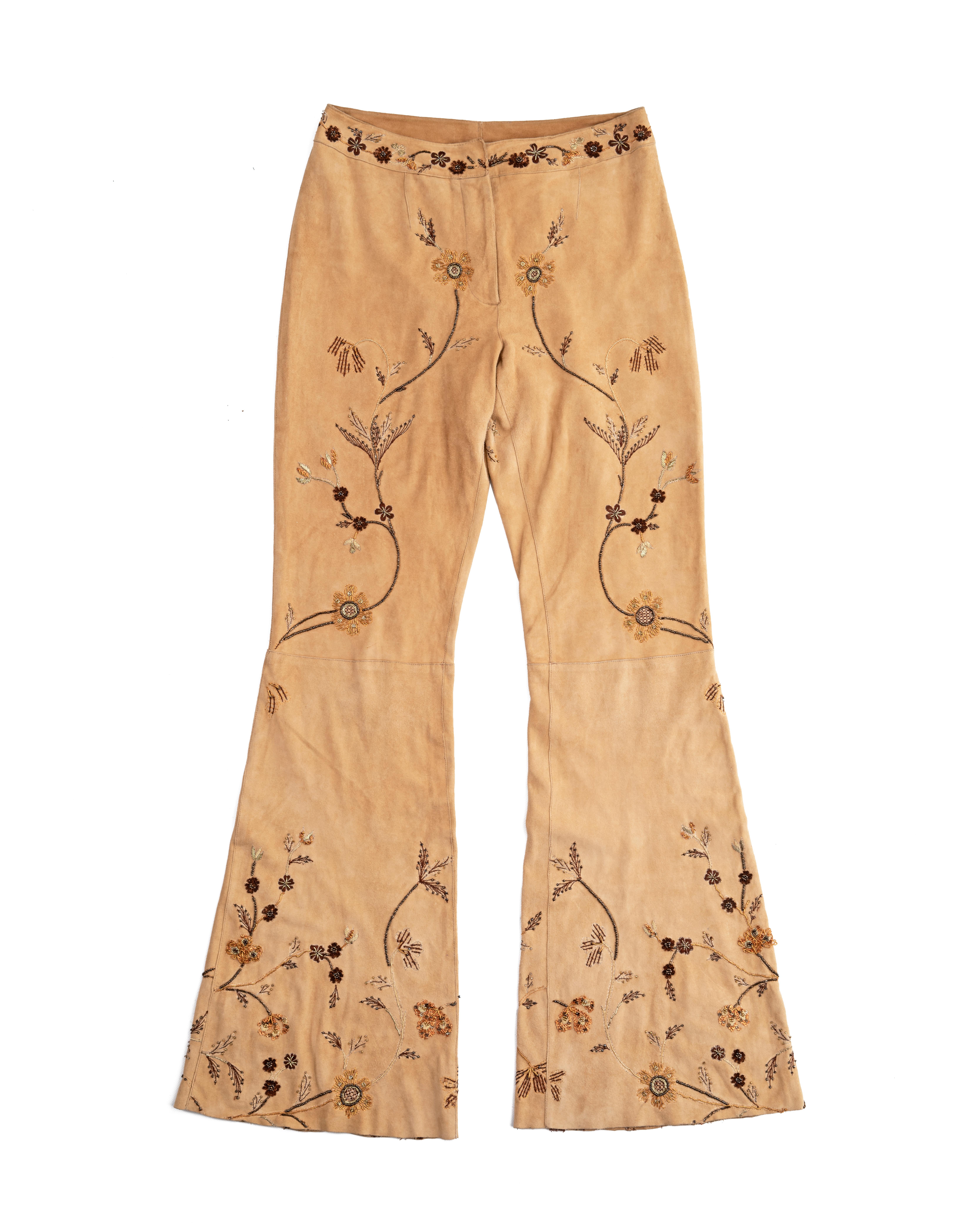 ▪ Dolce & Gabbana cream goat suede flared pants 
▪ Sold by One of a Kind Archive
▪ Spring-Summer 2001
▪ Floral embroidery 
▪ Animal-print lining 
▪ IT 38 - FR 34 - UK 6 - US 2
▪ Made in Italy

All photographs in this listing EXCLUDING any reference