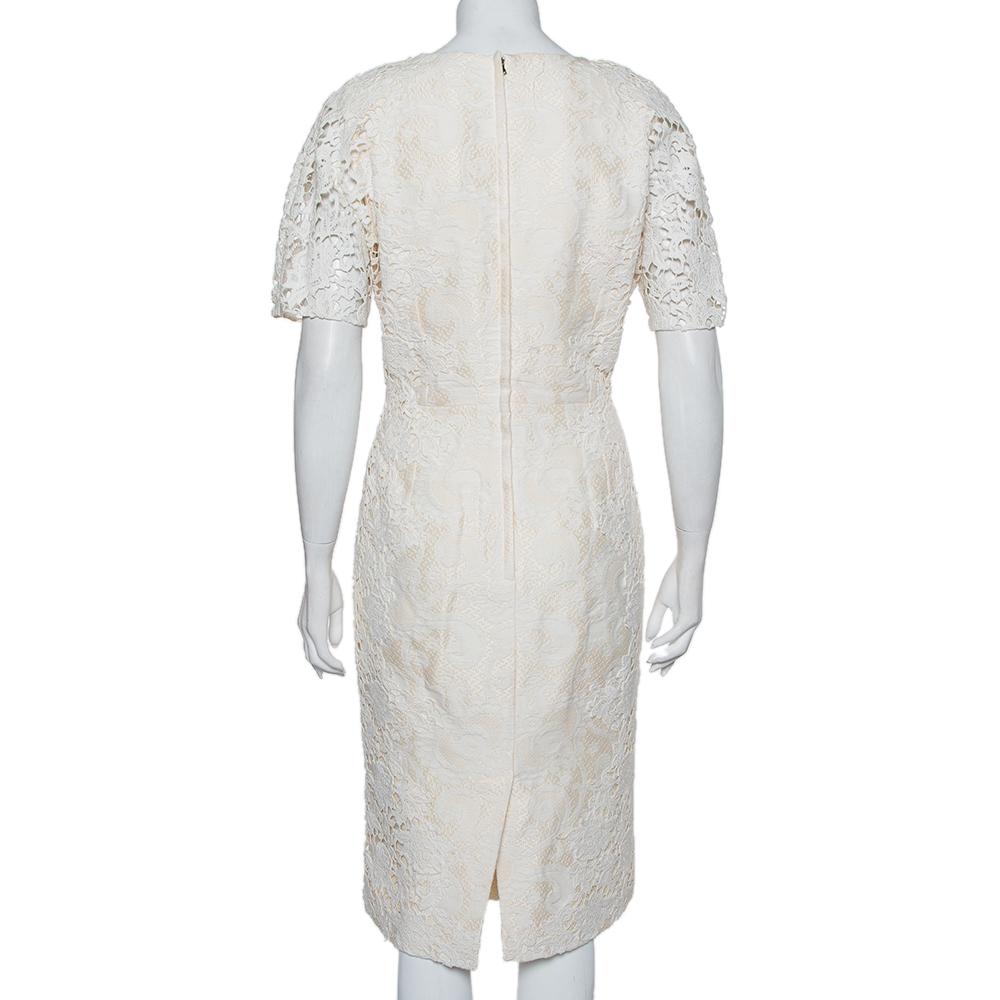 Stylish and elegant, this midi dress hails from the house of Dolce & Gabbana. It has been crafted from a jacquard material and crocheted trims. The simple neckline, short sleeves and streamlined silhouette will look great with a pair of pumps and