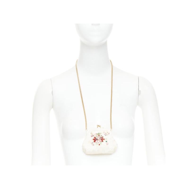 DOLCE GABBANA cream lace multicolour stone beaded kisslock chain micro bag
Reference: TGAS/F00386
Brand: Dolce Gabbana
Designer: Domenico Dolce and Stefano Gabbana
Material: Lace, Fabric
Color: Cream, Multicolour
Pattern: Lace
Closure: Kiss