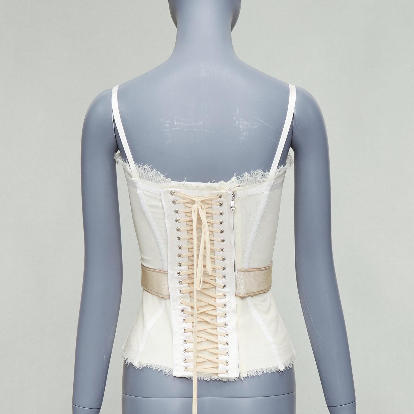 DOLCE GABBANA cream mesh lace trim corset bustier IT38 XS
Reference: TGAS/E00171
Brand: Dolce Gabbana
Designer: Domenico Dolce and Stefano Gabbana
Material: Fabric
Color: Cream, Nude
Pattern: Solid
Closure: Zip
Lining: Cream Fabric
Extra Details: