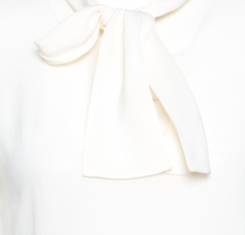 Dolce & Gabbana Blusa con detalle de lazo y apliques de encaje de seda color crema S Gris en venta