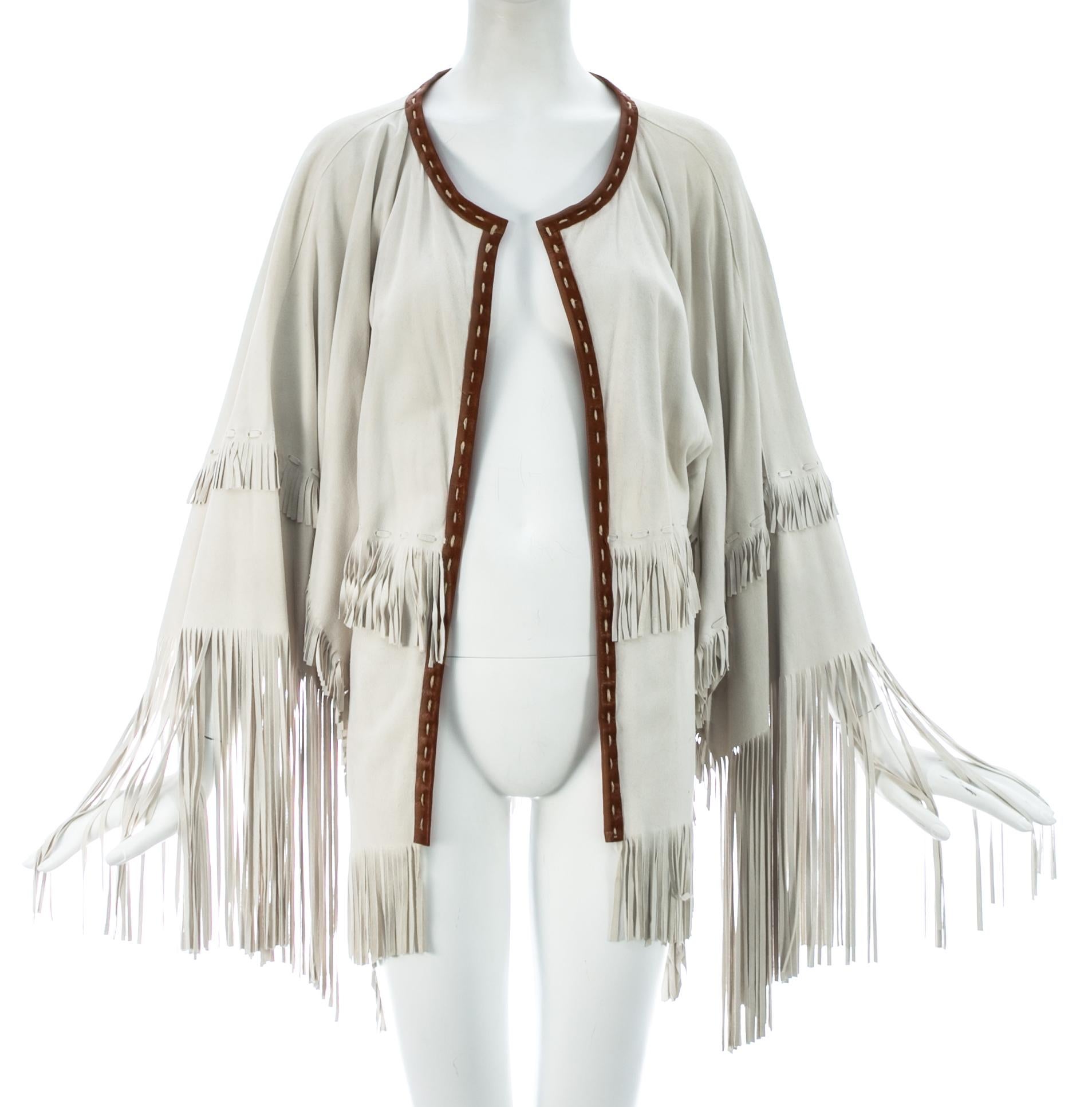 Dolce & Gabbana cream suede fringed poncho jacket with tan leather trim

Spring-Summer 2004