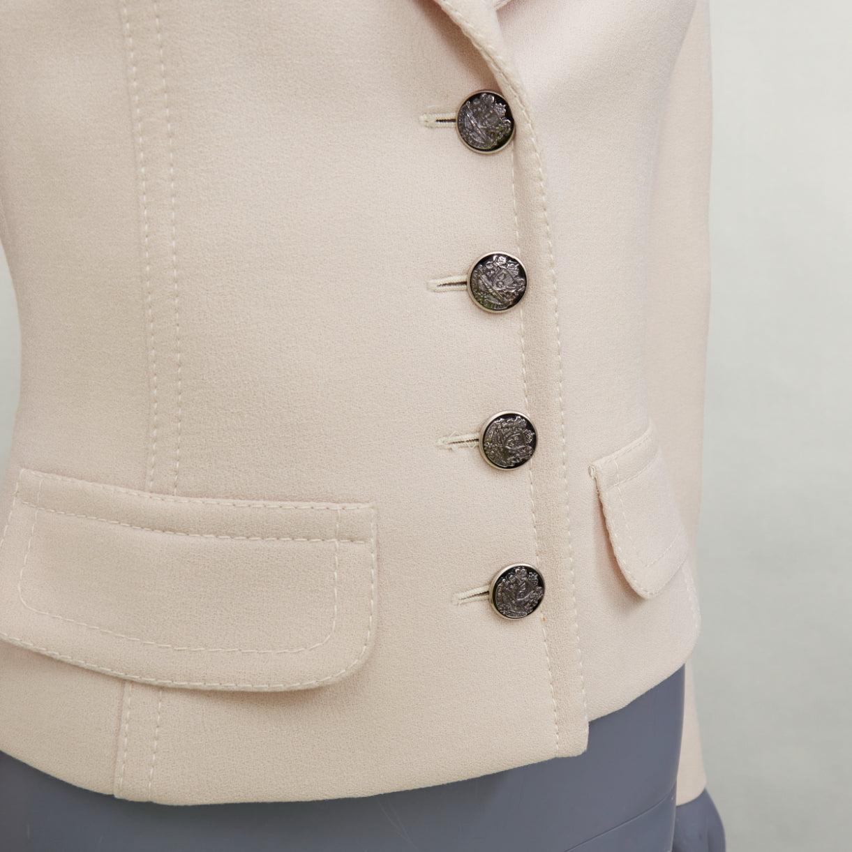 DOLCE & Gabbana blazer court à col tulipe en laine vierge crème IT36 XXS
Référence : CC/A00514
Marque : Dolce Gabbana
Designer : Domenico Dolce et Stefano Gabbana
MATERIAL : Laine vierge
Couleur : Crème, Argent
Motif : Solide
Fermeture :