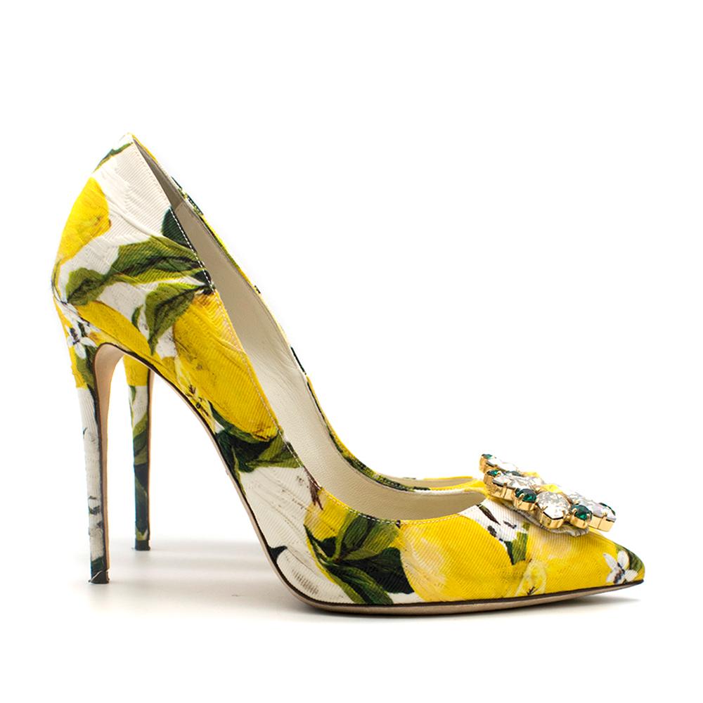 Dolce & Gabbana stilettos with a bright yellow lemon pattern. RRP £745

- Pointed toe
- Crystal embellished toe
- Heel height 11cm 
- Pattern leather insole
- Made in Italy

Please note, these items are pre-owned and may show signs of being stored