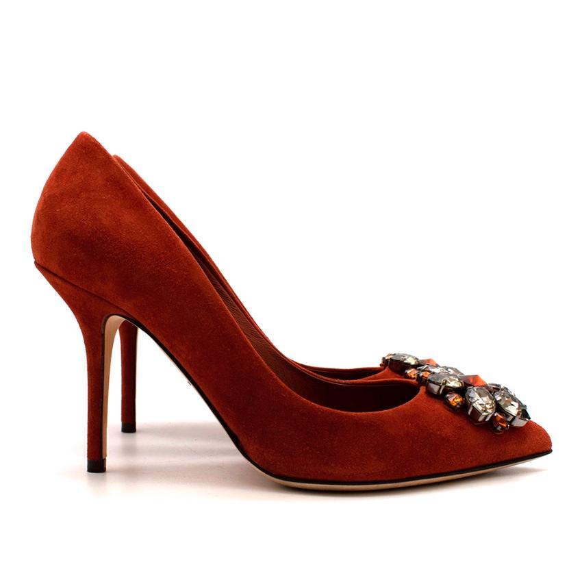 Dolce & Gabanna Rust Suede Crystal Pumps

-Luxurious soft velvet like suede 
-Soft leather lining for comfort 
-Gorgeous crystal flower like motif to the toes
-Pointy toes 
-Stiletto heels 
-Elegant classic style