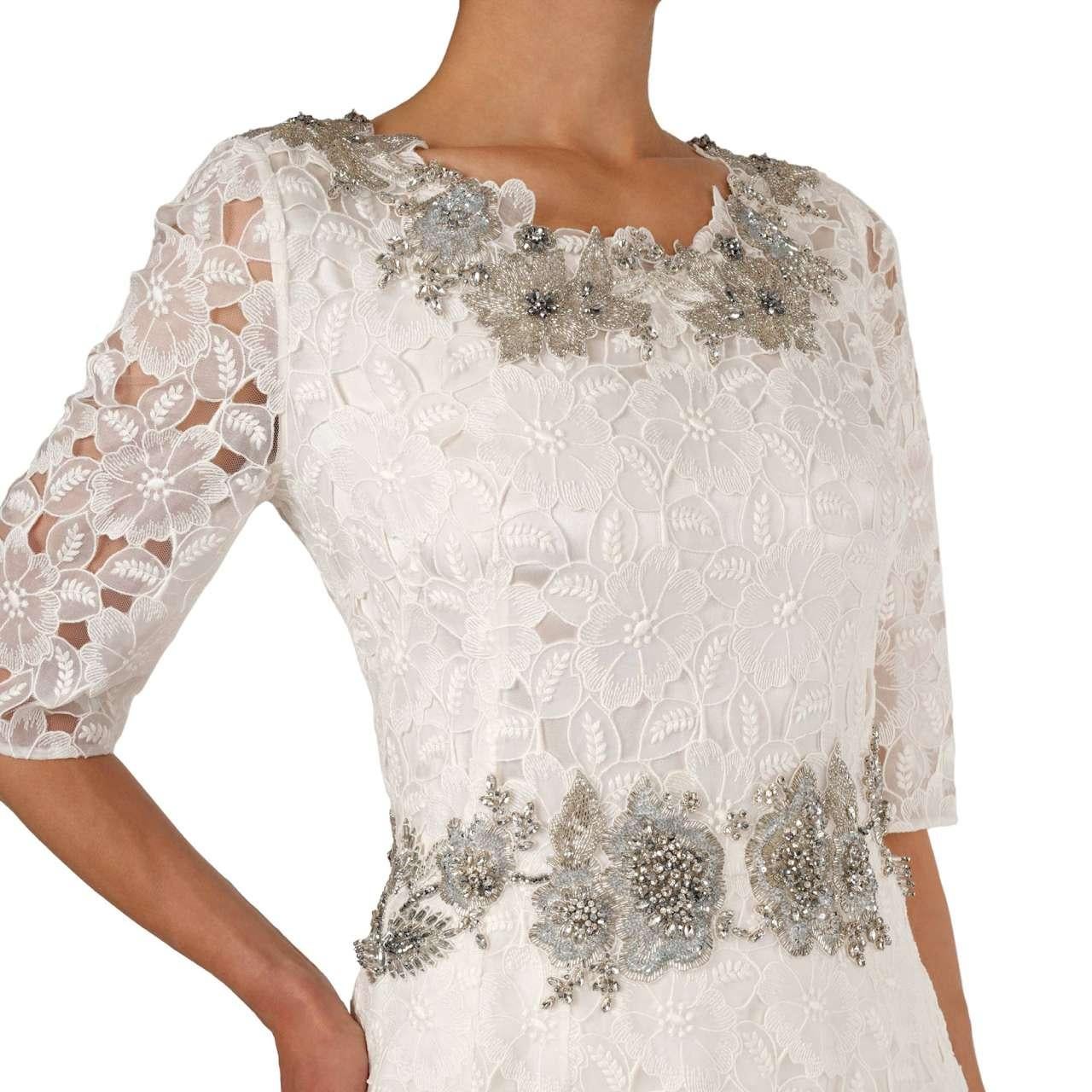 - Silk blend long wedding dress with floral lace, silk lining, pearls and crystal embroidery applications in silver and white by DOLCE & GABBANA - MADE IN ITALY - New with Tag - Concealed back zip closure - Long - Fitted waist - Silk lining with