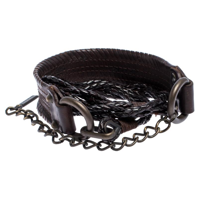 Statement accessories are always worth the buy and this belt from Dolce & Gabbana is one such creation that is sure to add oodles of style to your wardrobe! The dark brown belt is crafted from braided leather and styled with an interlocking
