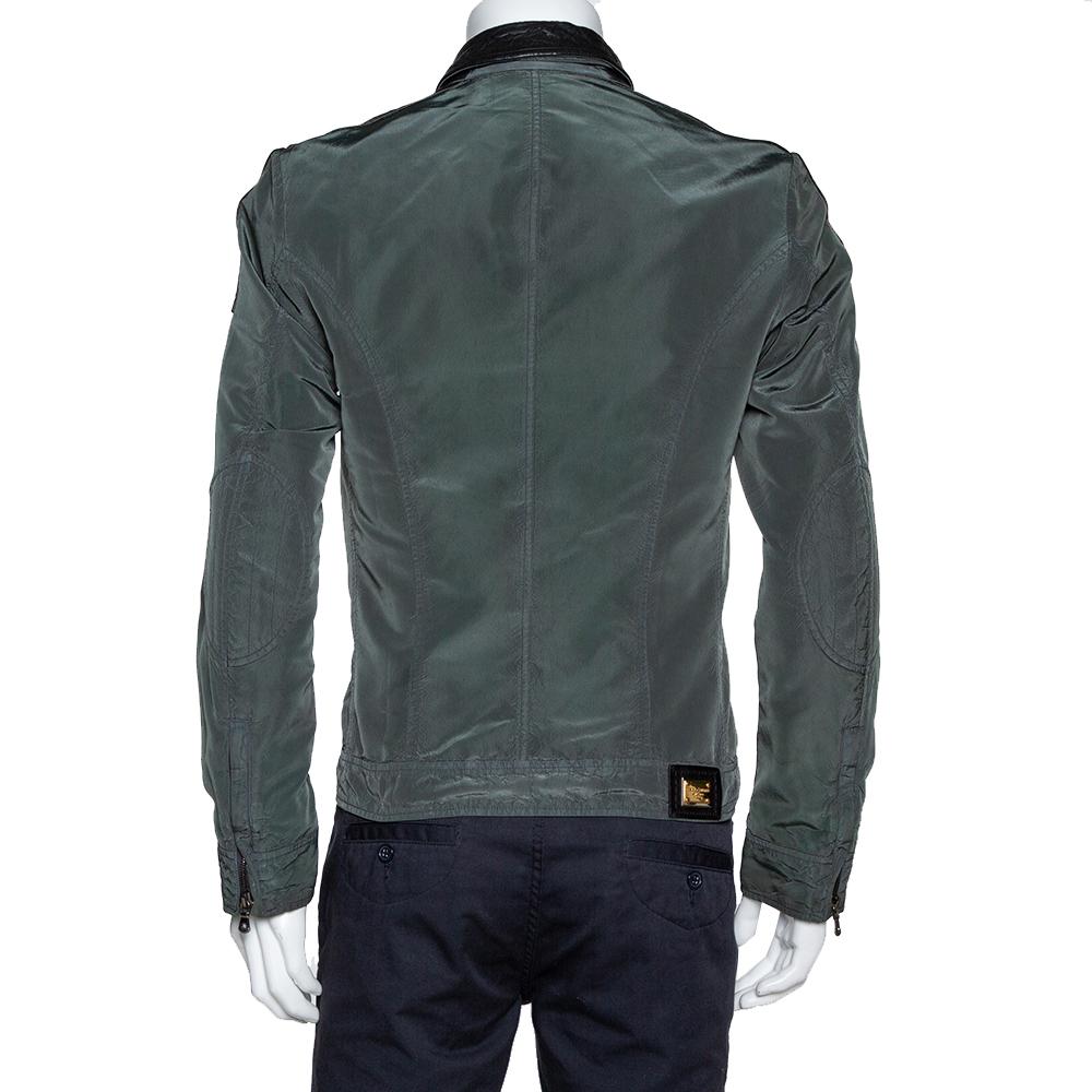 A sleek design executed using quality materials is this jacket by Dolce & Gabbana. This soft and comfortable dark green jacket featuring leather trims is going to be a reliable accessory.

