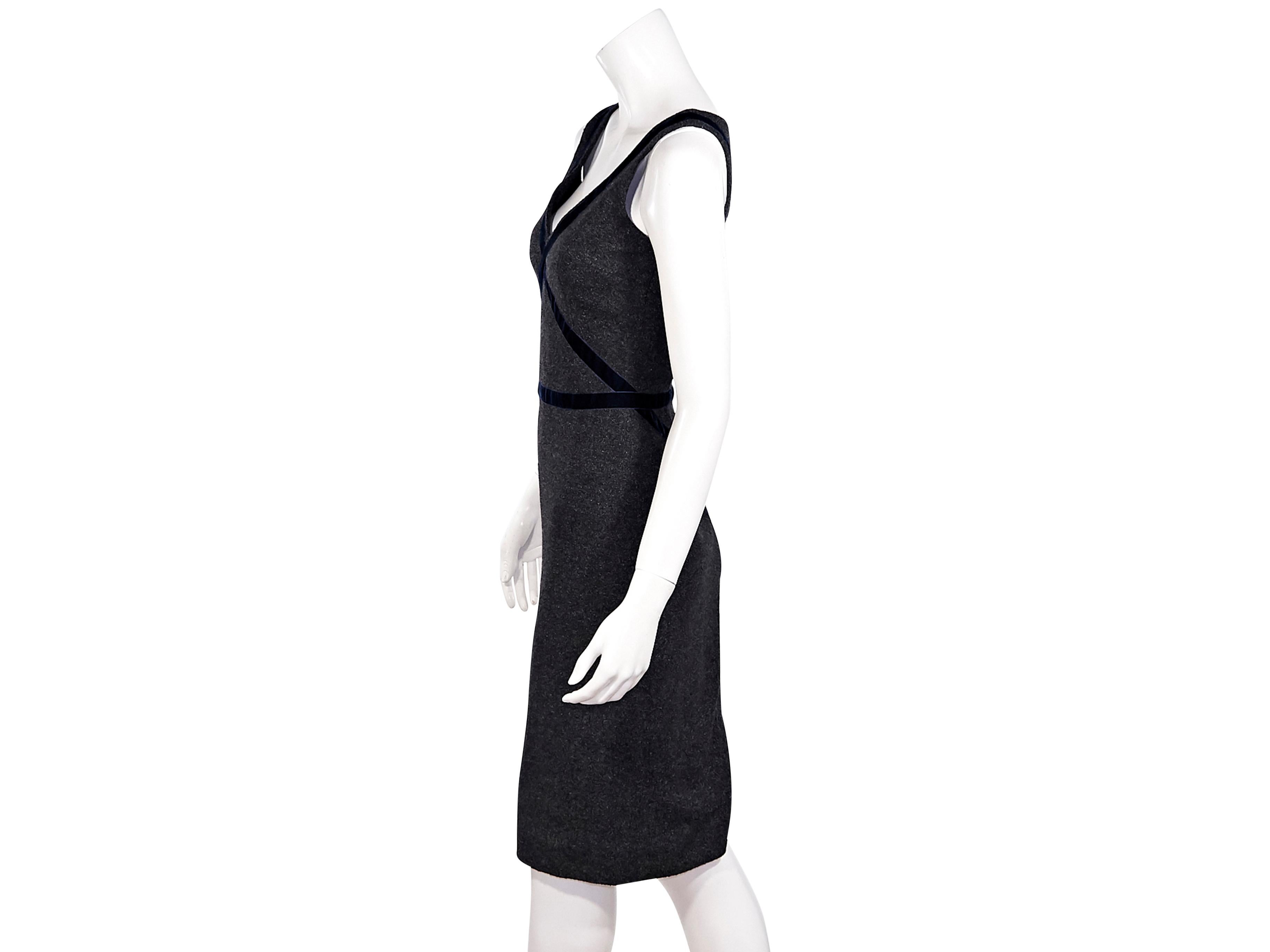 Product details:  Dark grey stretch-wool-blend sheath dress by Dolce & Gabbana.  Trimmed with blue velvet.  V-neck.  Sleeveless.  Concealed back zip closure.  Center back hem vent.  32