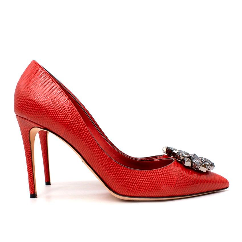 Dolce & Gabbana Deep Red Lizard Embossed Crystal Toe Heeled Pumps
 

 - Point toe, stiletto heeled pumps in a deep red embossed lizard, with a smokey clear crystal embellshment on the toe
 

 Materials:
 Leather
 

 Made in Italy
 

 PLEASE NOTE,