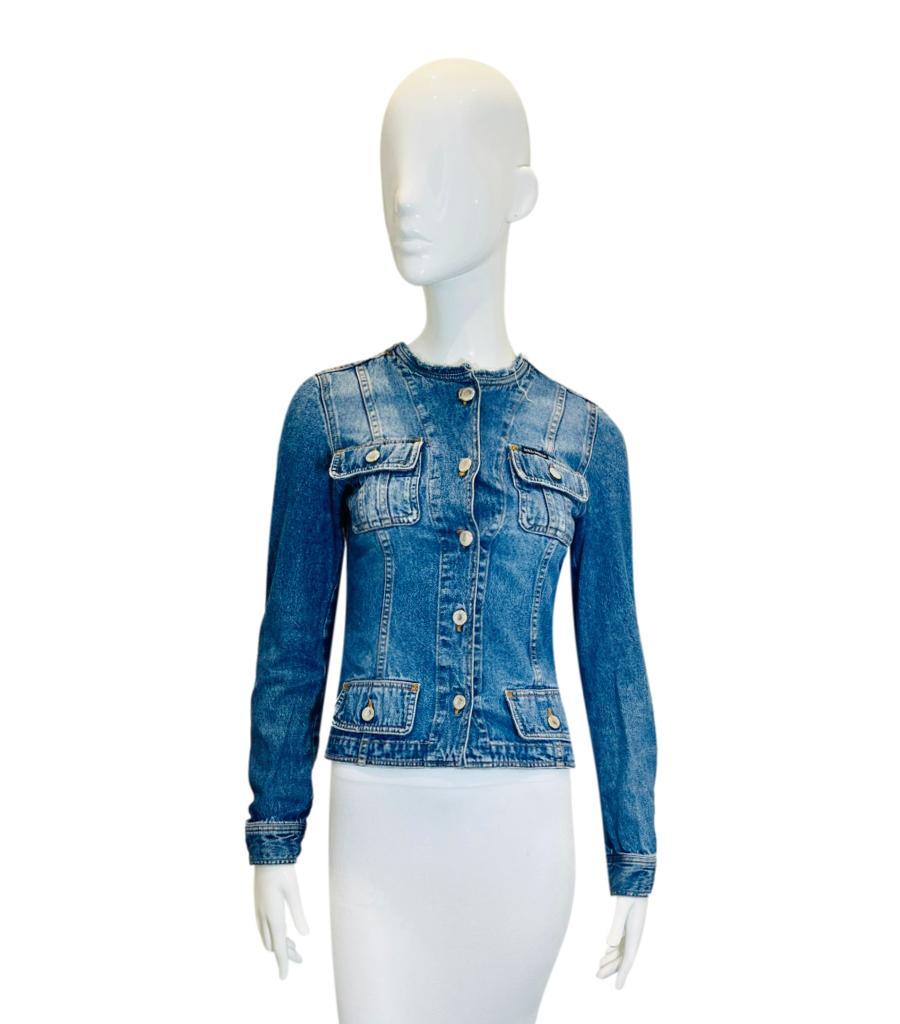 Dolce & Gabbana Denim Jacket.
Blue collarless denim jacket designed with four flap pockets to the front.
Featuring silver logo engraved buttons and raw edge crew neckline
Size – 38IT
Condition – Very Good
Composition – 100% Cotton
