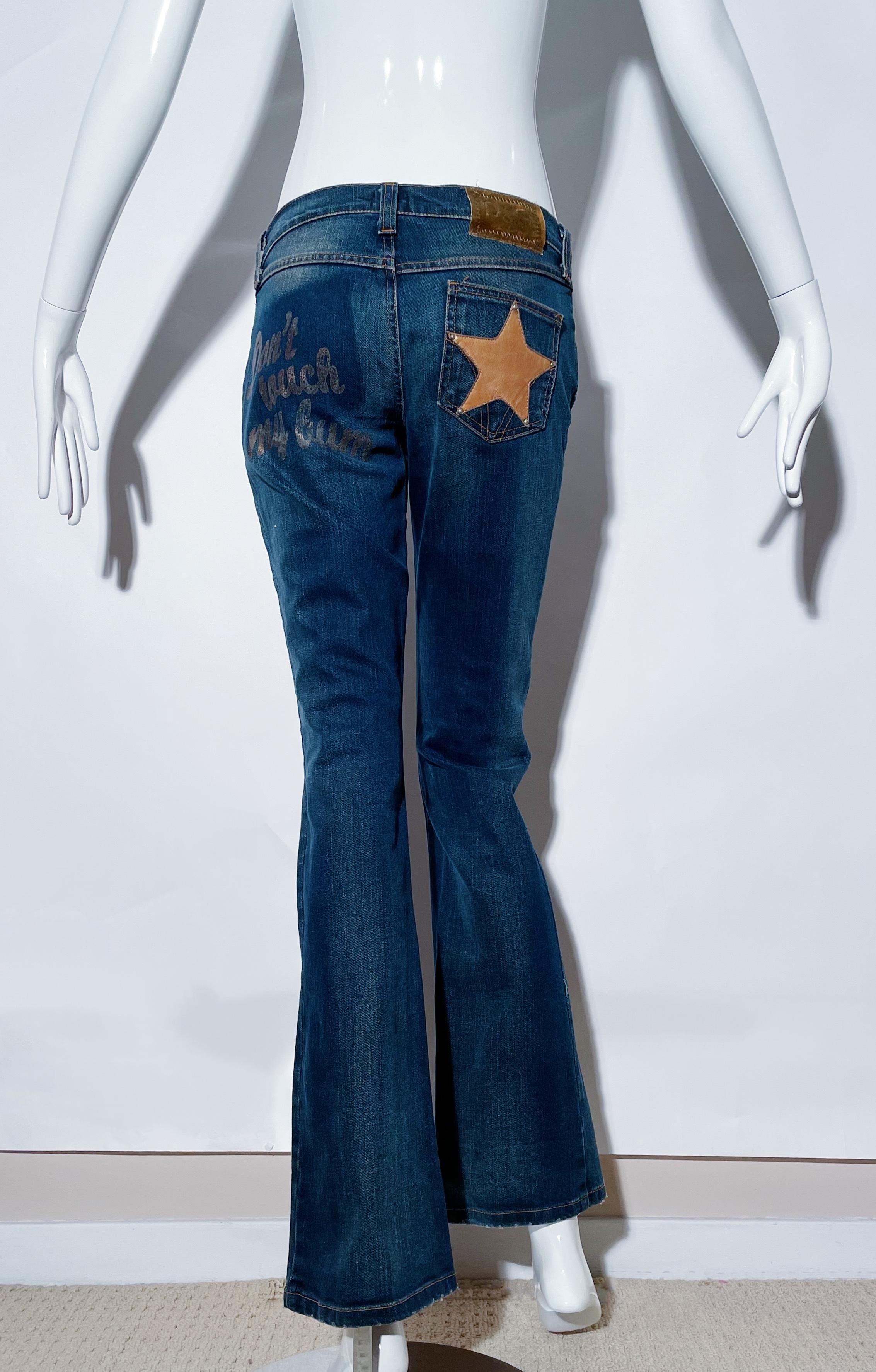 D & G denim jeans. “Don’t touch my bum” on rear. Leather star and front trim on pockets. Low rise. Front zipper closure. Cotton. Made in Italy. 
*Condition: excellent vintage condition. No visible flaws.

Measurements Taken Laying Flat