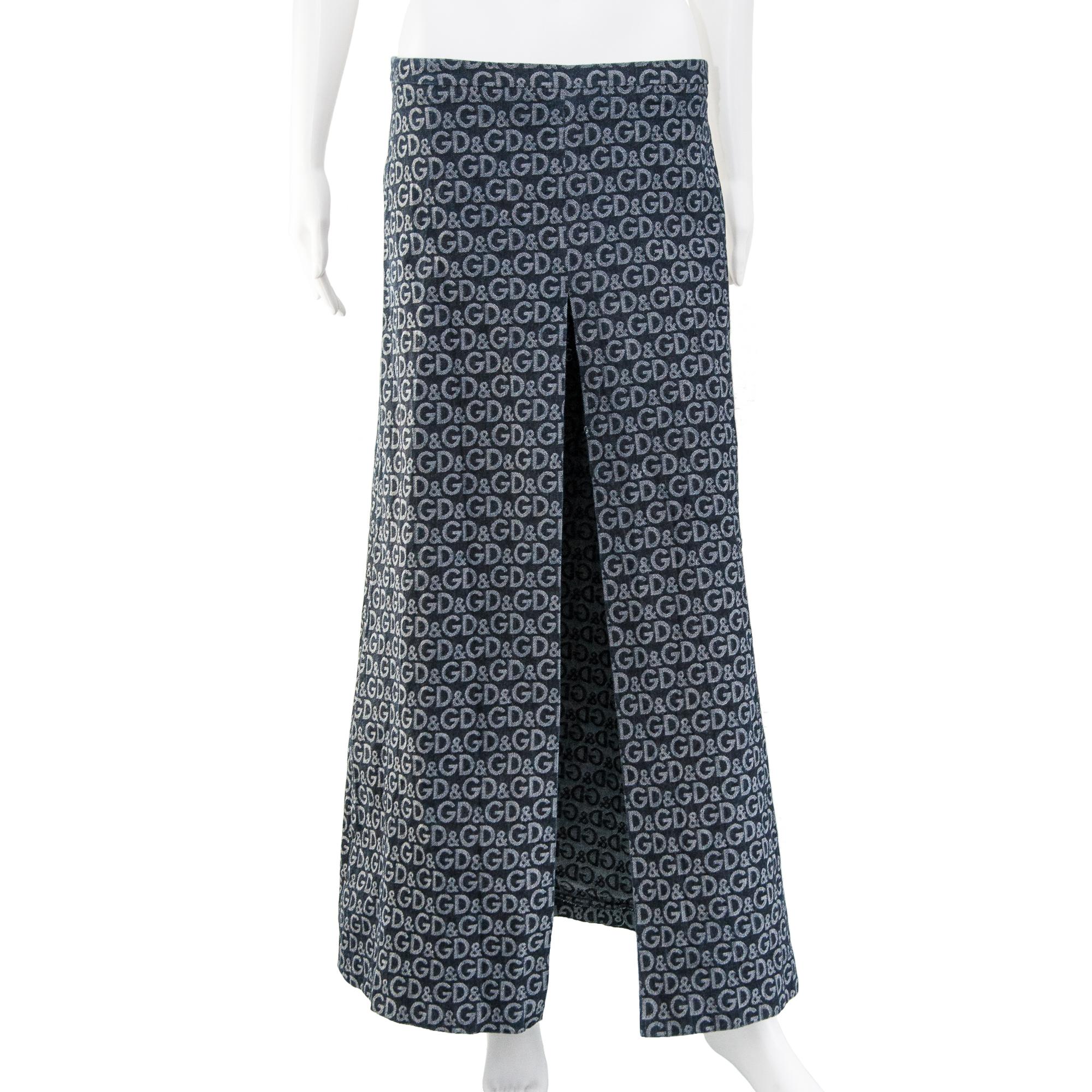 Ruder Than The Rest presents: 2000s D&G line monogram max skirt with centre split.

Dark indigo denim with contrasting dyed monogram logo pattern.

Fabric has lots of stretch.

Centre thigh-high split on the front.

Vintage, circa