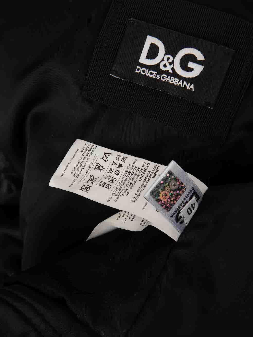 CONDITION is Very good. Hardly any visible wear to jacket is evident on this used D&G designer resale item.
 
 
 
 Details
 
 
 Black
 
 Leather
 
 Biker jacket
 
 Mid length
 
 Front zip closure
 
 Zipped cuffs
 
 2x Front snap buttoned pockets
 
