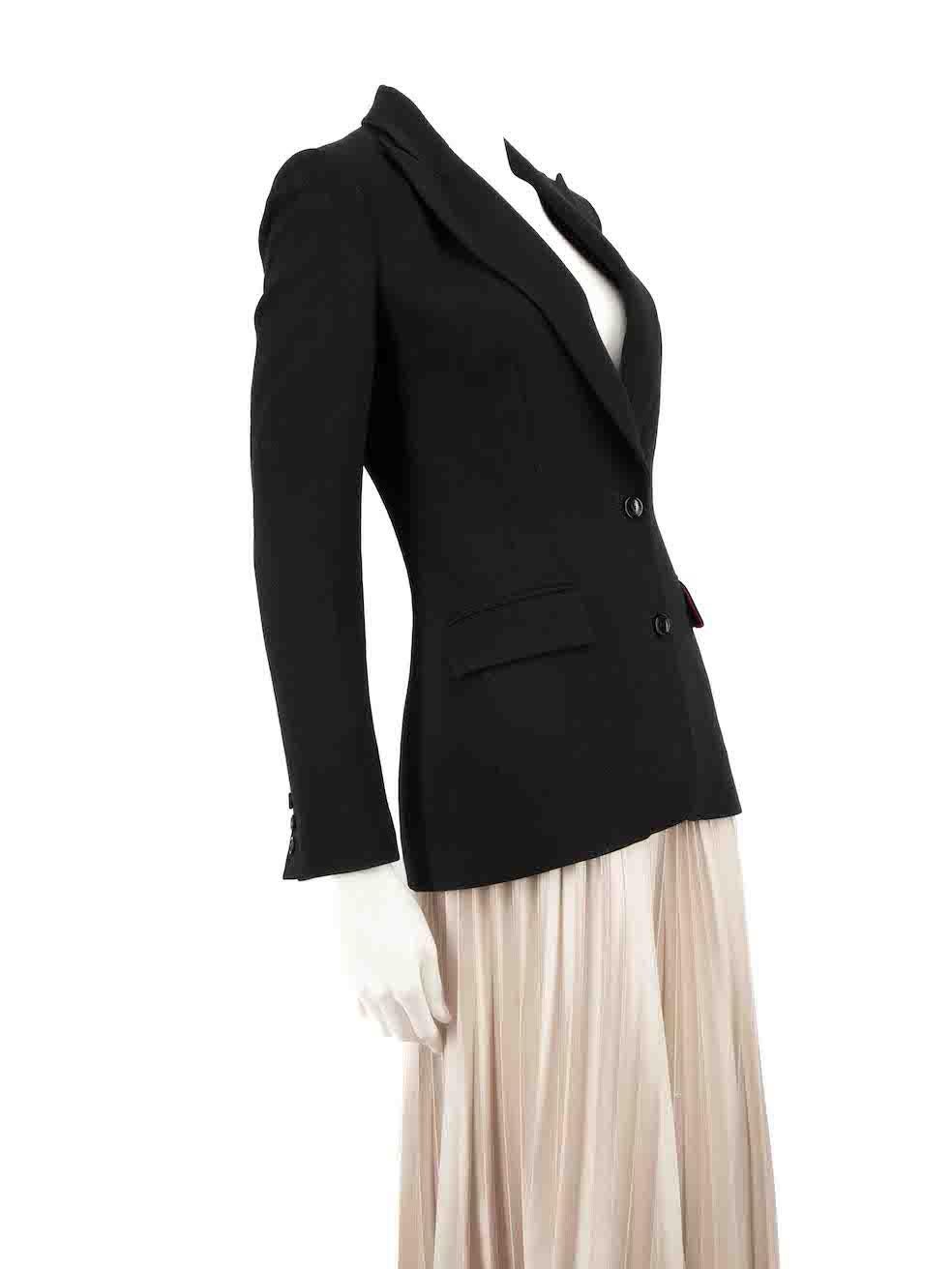 CONDITION is Very good. Minimal wear to blazer is evident. Minimal wear to the underarms at the lining with tears to the seams on this used D&G designer resale item.
 
 Details
 Black
 Wool
 Blazer
 Shoulder pads
 Button up fastening
 3x Front
