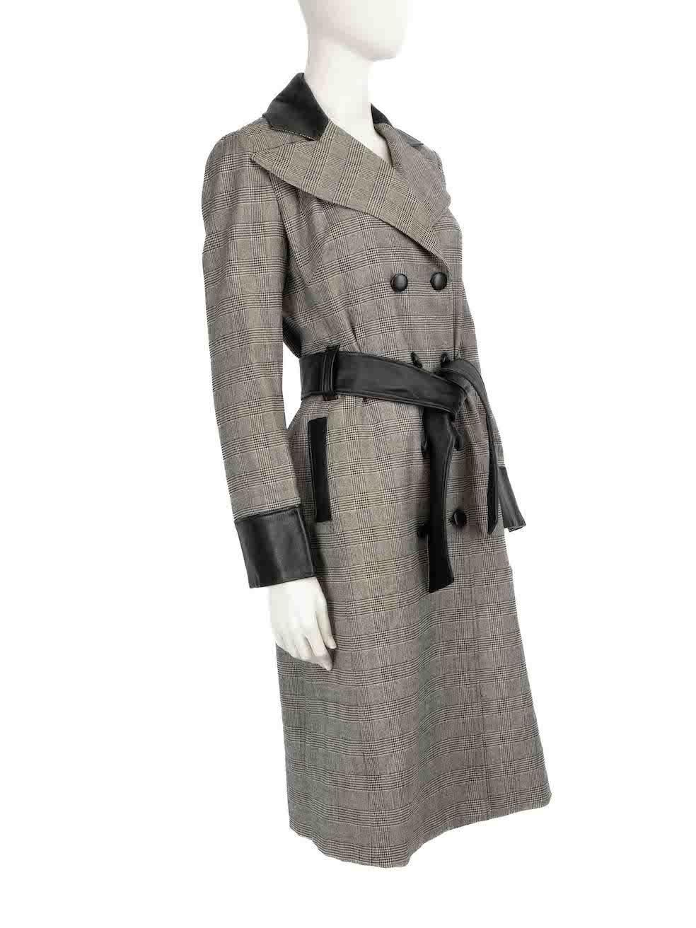 CONDITION is Very good. Minimal wear to coat is evident. Minimal wear to the fabric composition with a couple of very small plucks to the weave seen down the front and a slight musty odor to the fabric on this used D&G designer resale item.
 
 
 
