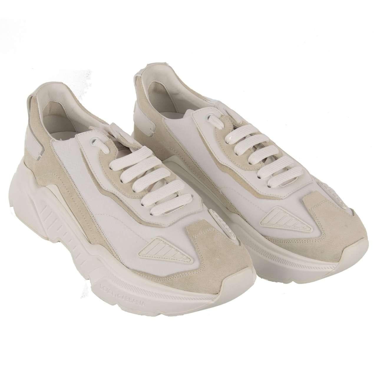 - Low-Top Sneaker DAYMASTER with massive sole and DG logo on the back in white by DOLCE & GABBANA - New with Box - Model: CS1765-AX014 - Material: 60% Calfskin, 40% Nylon - Sole: Rubber - Color: White - Leather insole - Logo on the back -
