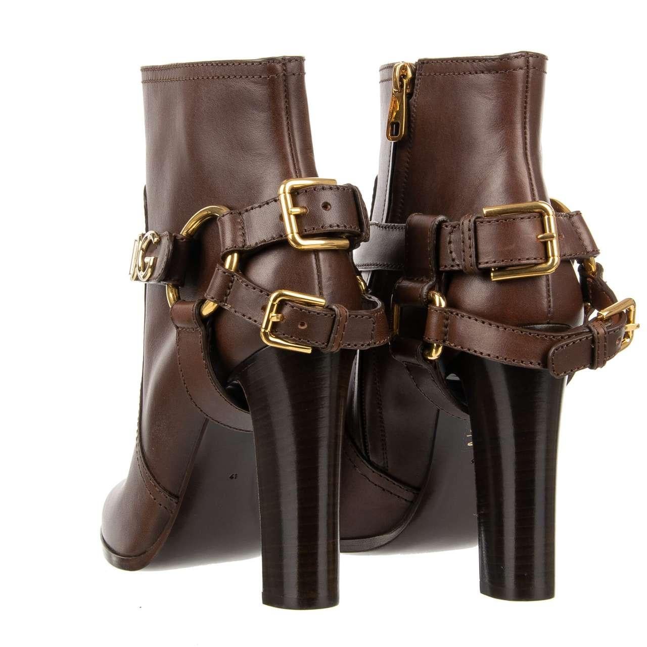 - Leather Boots CAROLINE with metal DG Logo and straps in brown by DOLCE & GABBANA - MADE IN ITALY - New with Box - Model: CT0698-AW673-80048 - Material: 100% Calf leather - Sole: Leather - Color: Brown - DG Golden metal logo - Zip Closure - Heel: