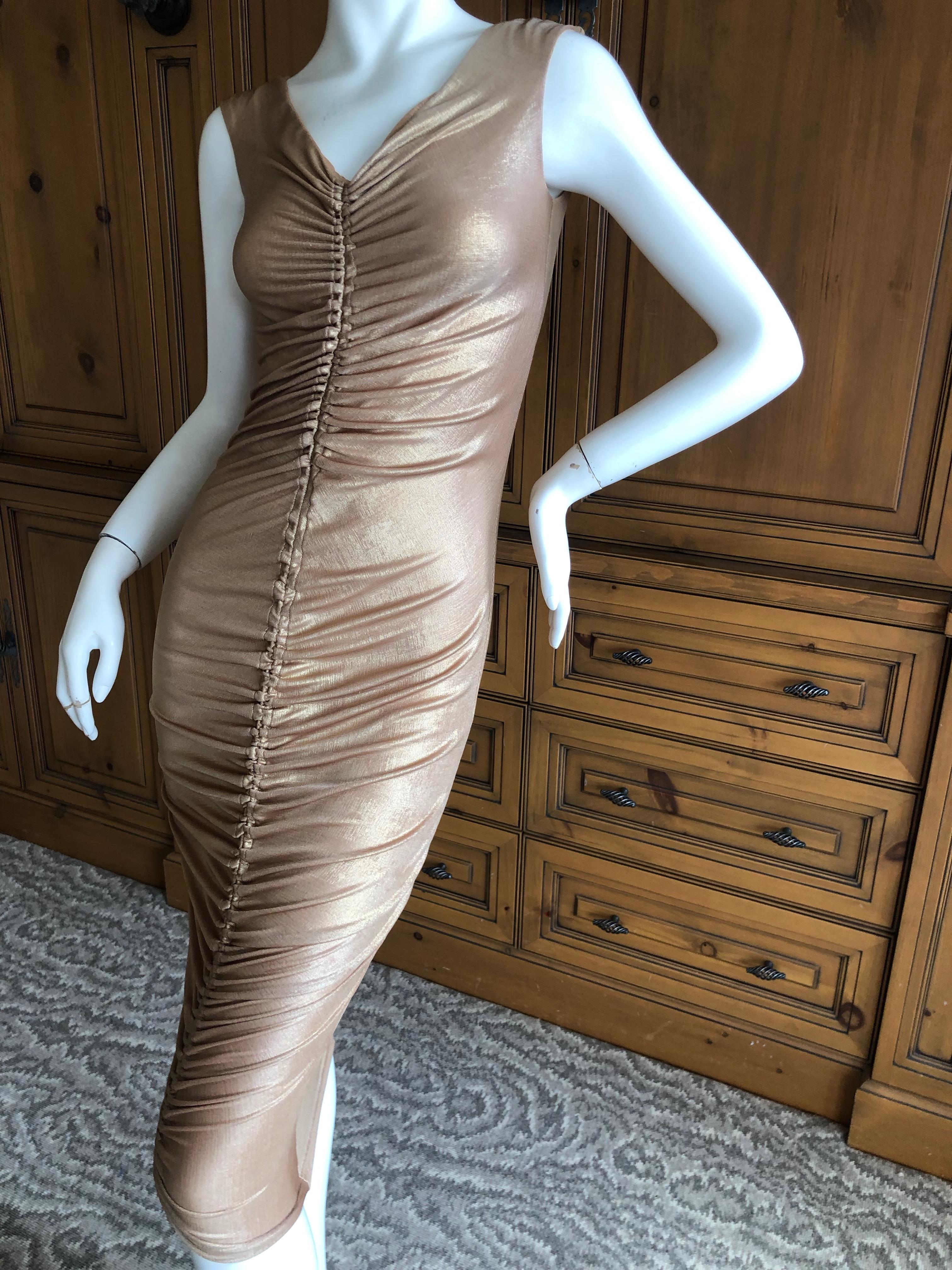 Dolce & Gabbana D&G Vintage Gold Ruched Bodycon Cocktail Dress
  There is  a lot of stretch.
Size 40
Bust 32