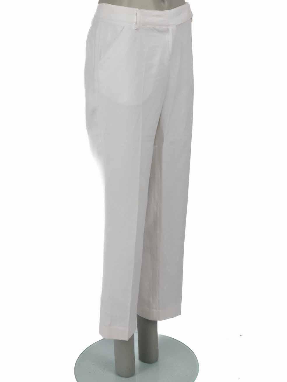 CONDITION is Good. Minor wear to trousers is evident. Light discoloured markings to overall fabric, slight pilling to inner legs and minor loose thread on belt loop on this used D&G designer resale item.
 
Details
White
Cotton
Trousers
Tapered
Mid