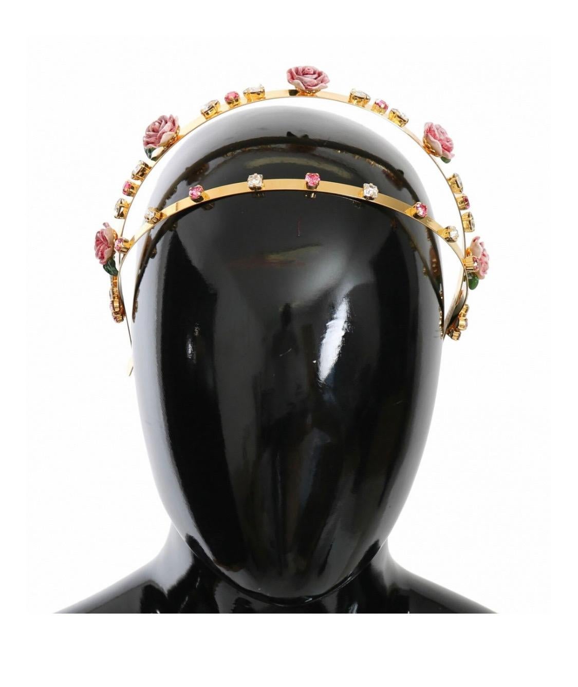 Dolce & Gabbana

Absolutely stunning, 100% Authentic,
brand new with tags Dolce &
Gabbana Diadem.

Model: Diadem Headband

Color: Gold

Theme: Clear and Pink crystal, Pink
Roses

Material: 20% Crystal, 60% Brass,
Resin

Logo details

Made in