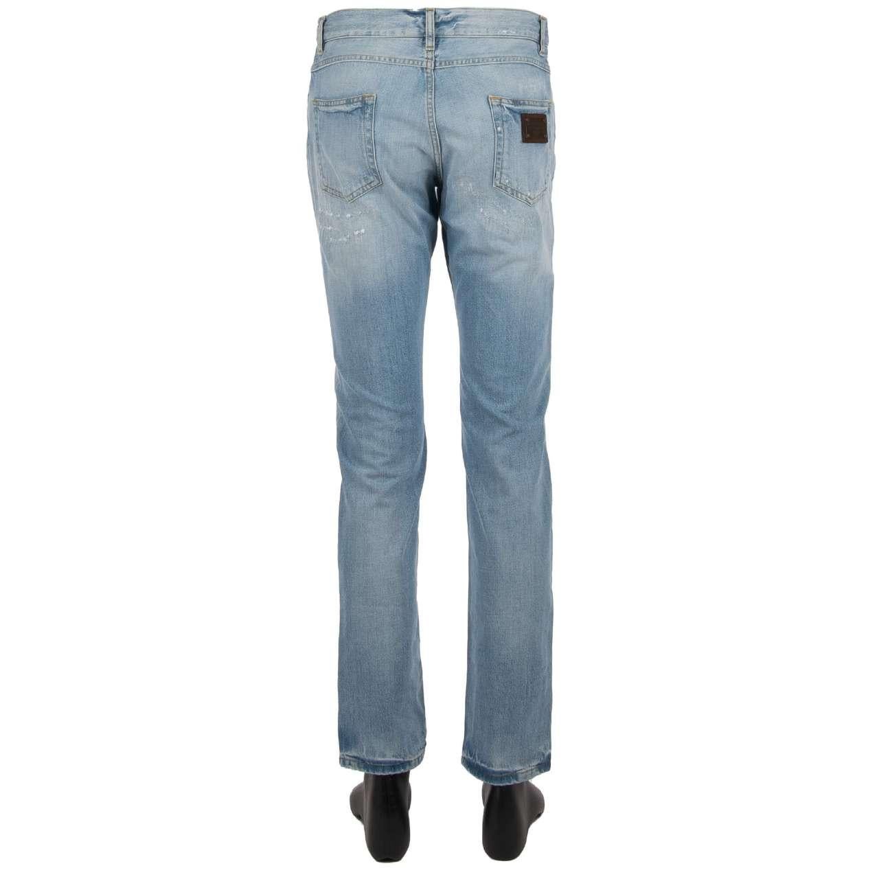 - Distressed straight cut 5-pockets Jeans with a large logo plate and logo sticker by DOLCE & GABBANA - New with tag - MADE IN ITALY - Former RRP: EUR 445 - Straight Cut - Model: GYJCCD-G8000-S9001 - Material: 100% Cotton - Color: Light Blue - 5