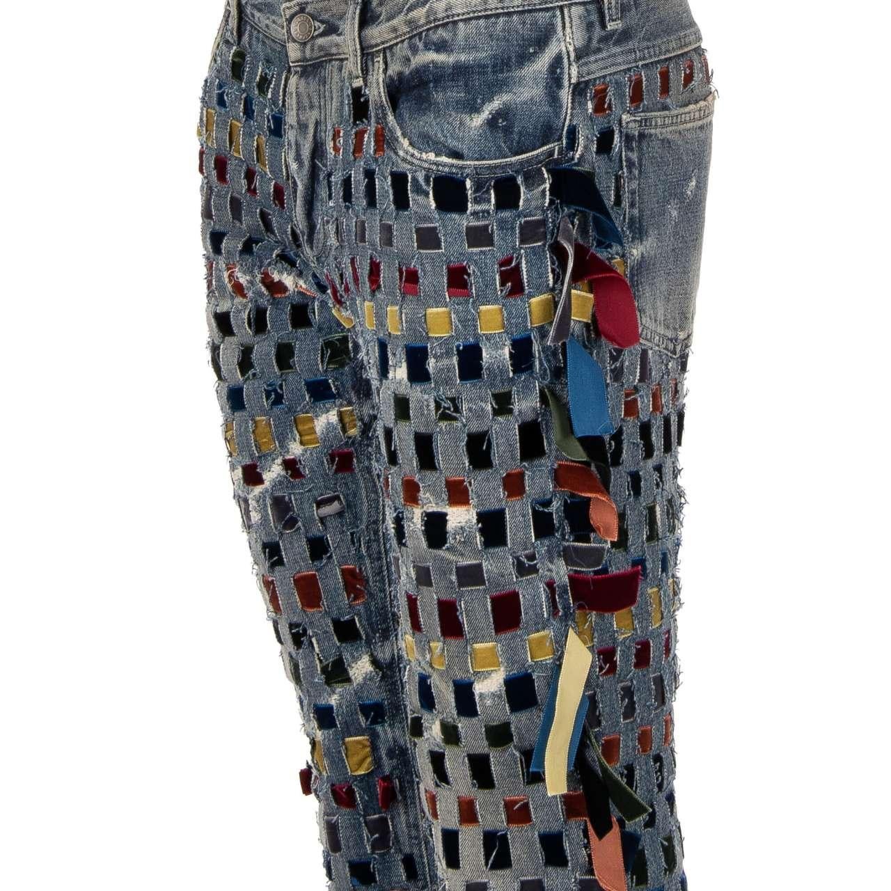 - Distressed straight cut 5-pockets Jeans with hand crafted velvet ribbons net structure by DOLCE & GABBANA - New with tag - MADE IN ITALY - Straight Cut - Model: GY70LD-G8V45-S9001 - Material: 100% Cotton - Color: Light Blue - 5 Pockes Jeans - Hand