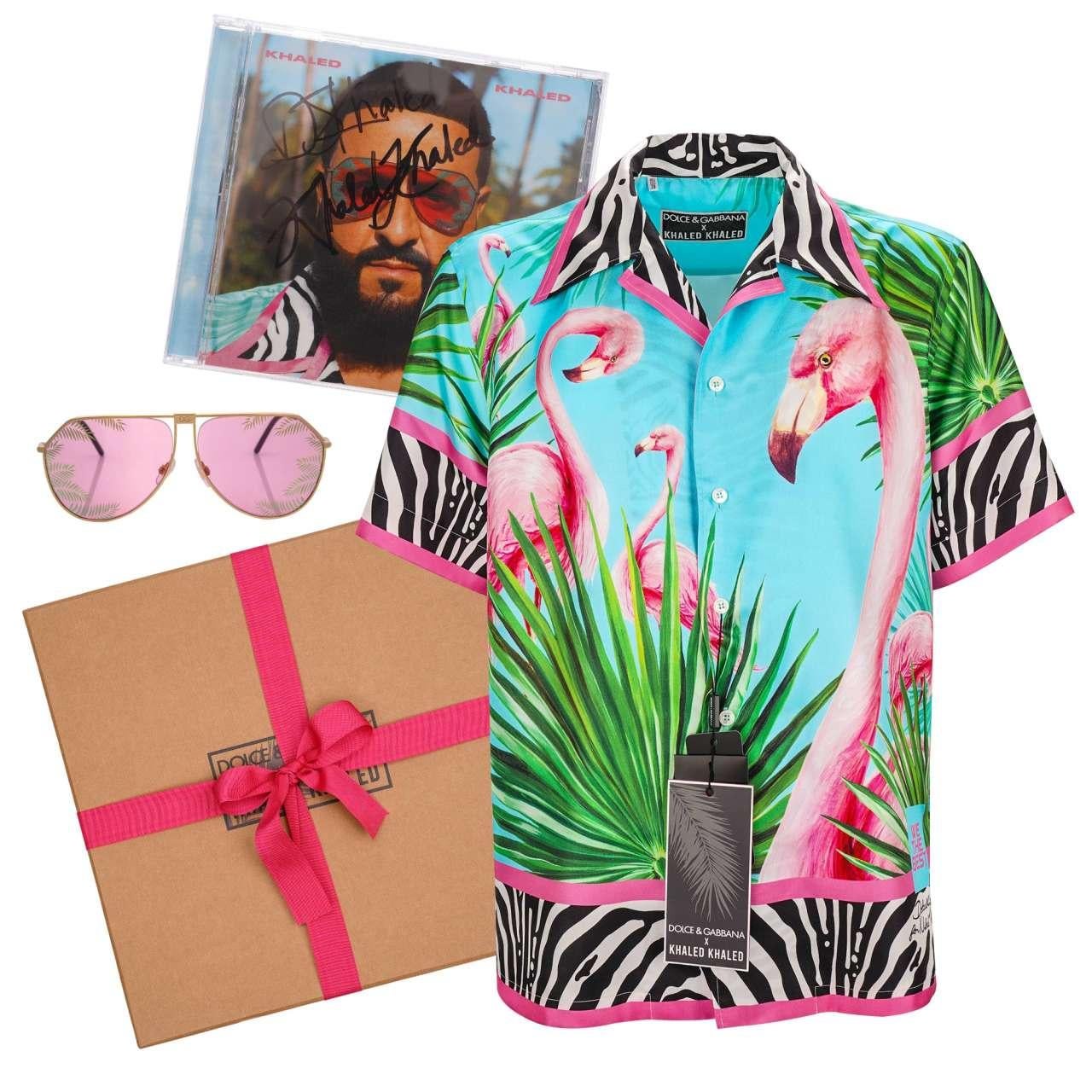 - Special edition by DJ Khaled and DG with Silk Flamingo and Zebra print shirt, tropical Sunglasses and signed CD by DOLCE & GABBANA X KHALED KHALED - New with special Box - Former RRP: EUR 1,255 - MADE IN ITALY - Wide F- Model: I5661M-FI17U-HT3IV -