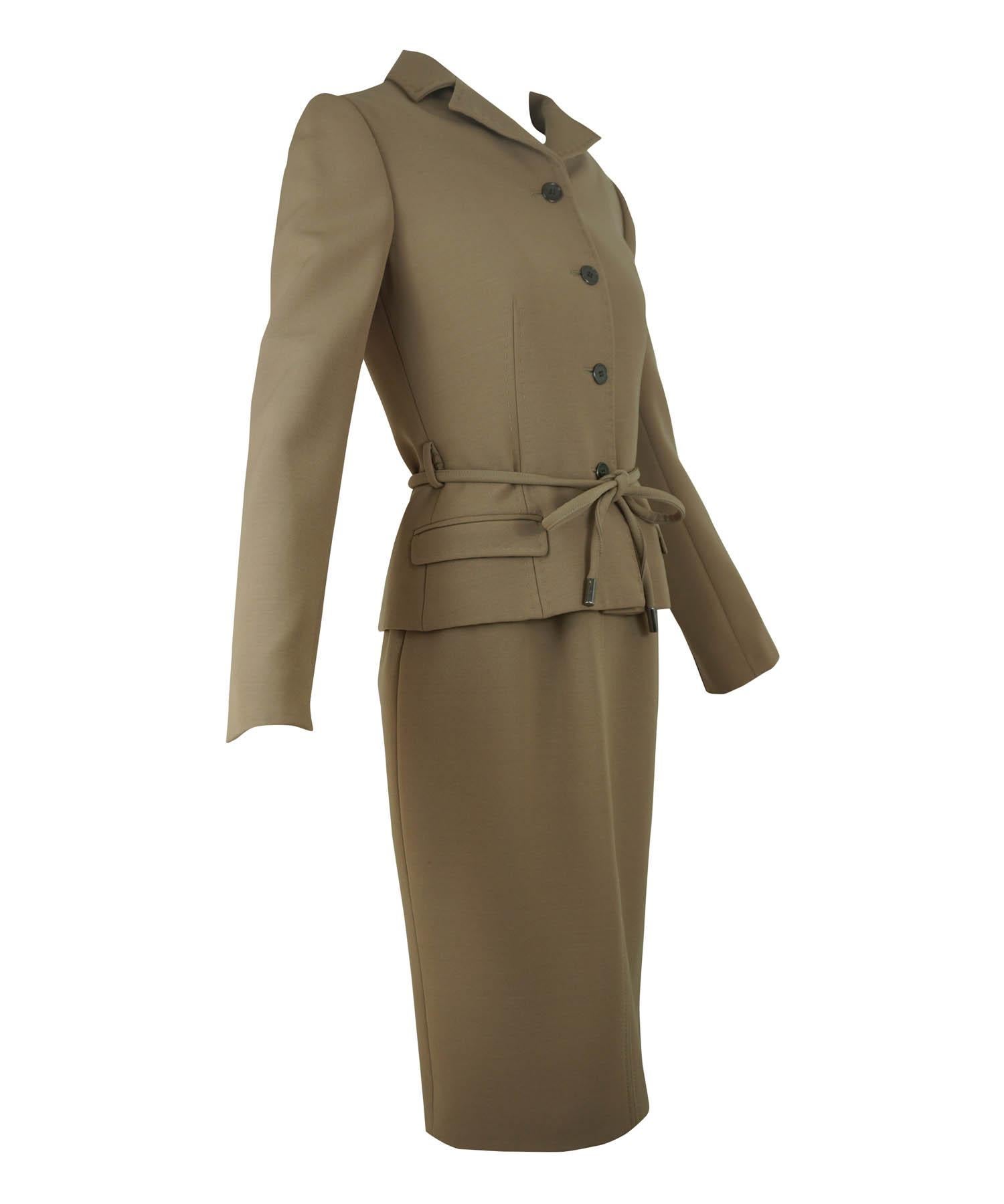 Dolce & Gabbana camel color wool suit, comprised of a sleeveless dress and belted jacket with a self fabric tie belt at waist. Set features signature leopard lining, topstitched welted seams, fitted silhouette and a concealed rear zipper on dress.