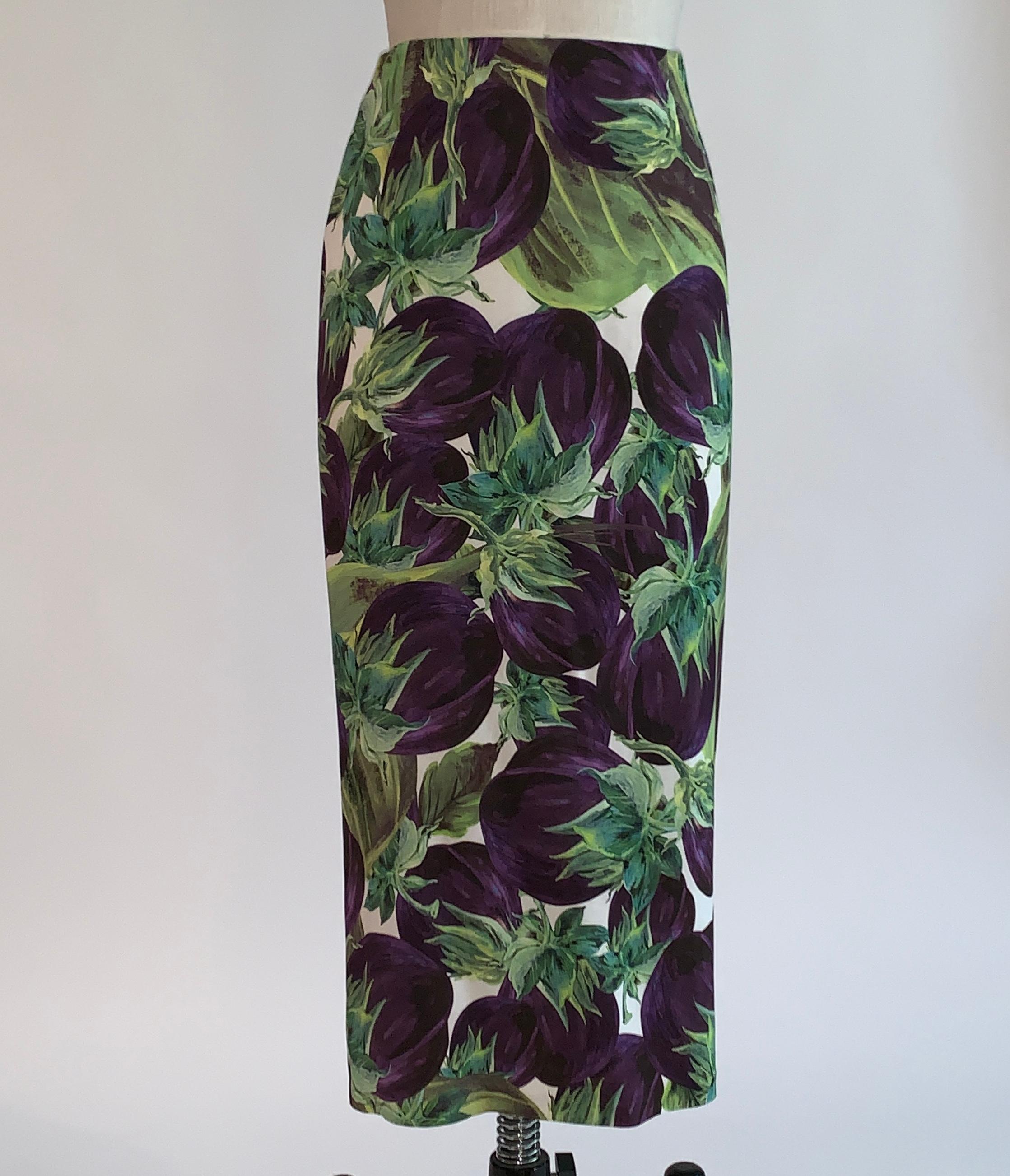 Dolce & Gabbana eggplant print pencil skirt in purple, white, and green from their Spring 2012 collection. Back zip and hook and thread loop closure.

96% viscose, 4% elastane. Unlined. 

Made in Italy.

Size IT 42, approximate US 6. See