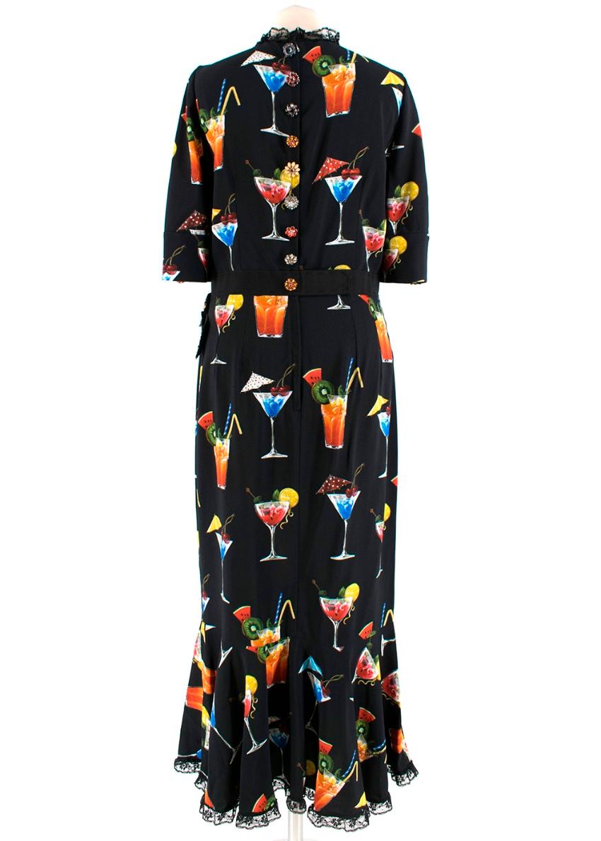 Dolce & Gabbana Embellished Cocktail Print Crepe De Chine Dress

- colourful cocktail print - lace hem - V Neck with lace trim - Cuff sleeves with embellished buttons - zip fastening at the back - adorned bow at the waist - elbow length