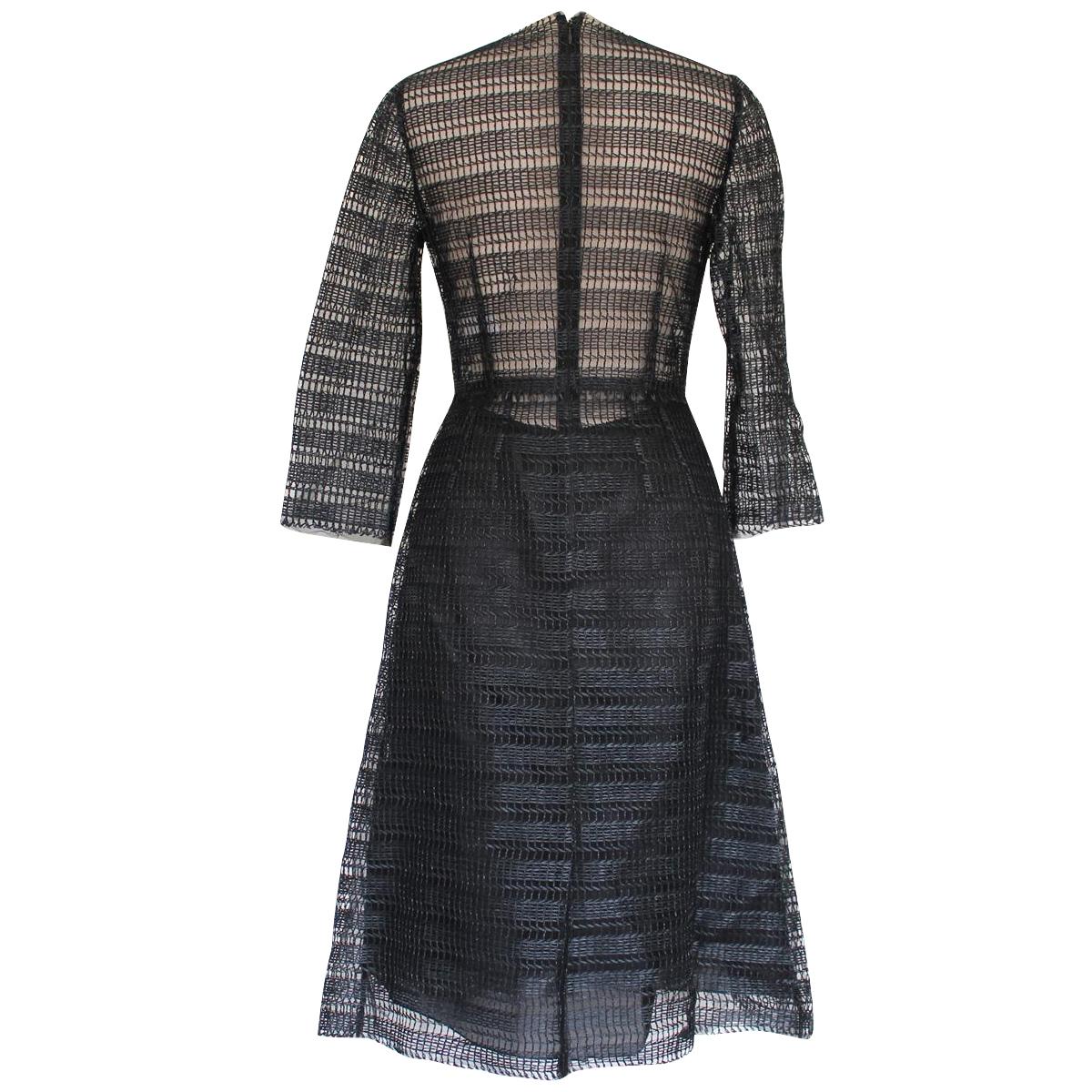 Wonderful raffia dress by Dolce & Gabbana
Viscose (60%) Polyamide
Black color
Transparent
Long sleeves
Total length cm 106 (41.7 inches)
Shoulder cm 35 (13.7 inches)
Worldwide express shipping included in the price !