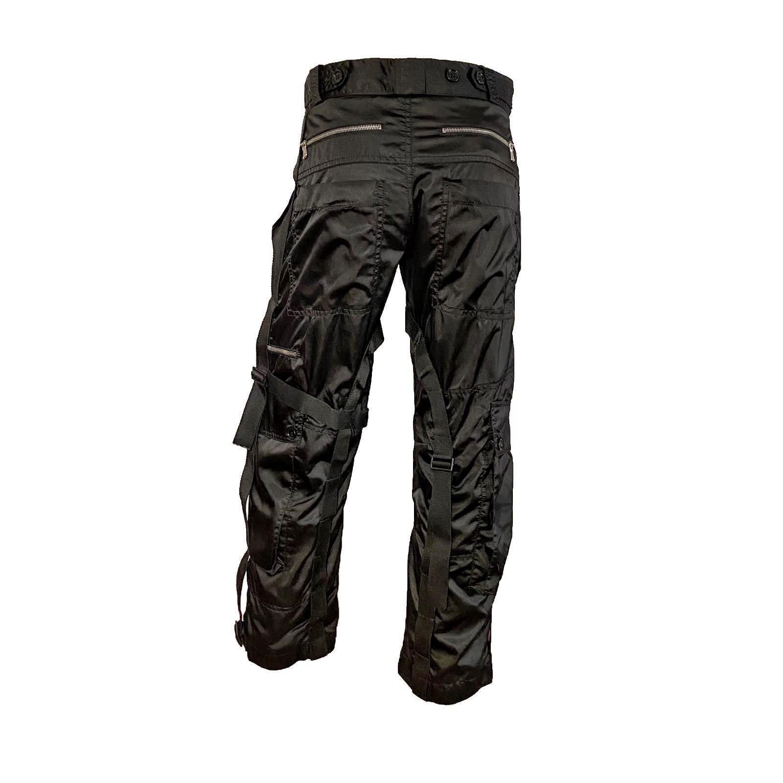 Dolce & Gabbana Black Bondage Cargo Pants from the Men‘s Fall/Winter 2003 collection.

Label size: S ( IT40 US 27)

Measurements: 

Waistline: 77 cm / 30,3 inch
Inseam: 68 cm / 26,7 inch
Outseam: 93 cm / 36,6 inch
Leg opening: 46 cm / 18,1 inch