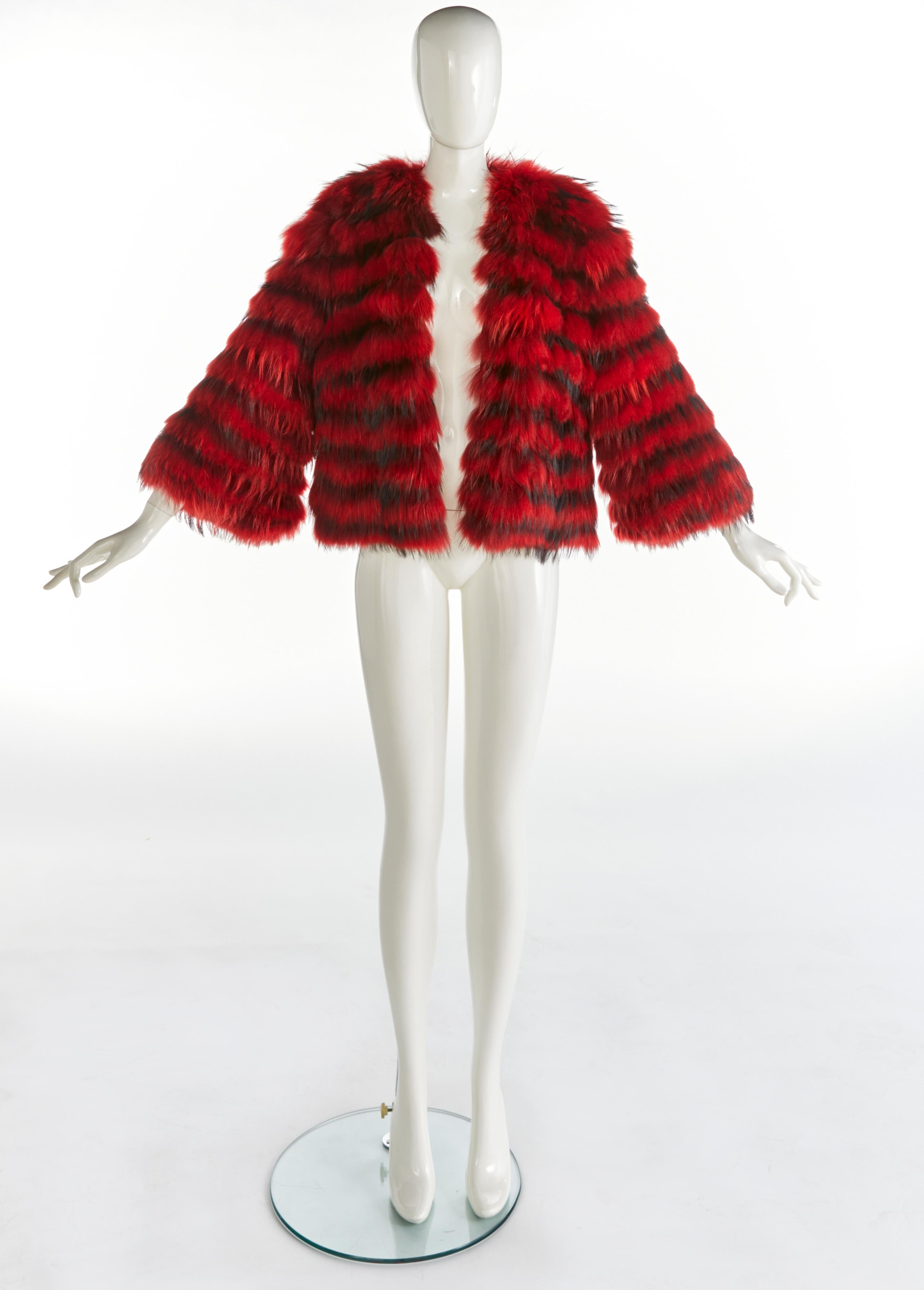 
Iconic Dolce & Gabbana Vintage Red Tipped Black Fox Fur Jacket from the F/W 1999 runway collection




Collection: Fall 1999
Size: M ( Suitable for US : 4 / 6 / 8 / 
Condition: Very Good 
Lining: 100% Silk 

The twin of this piece was worn by