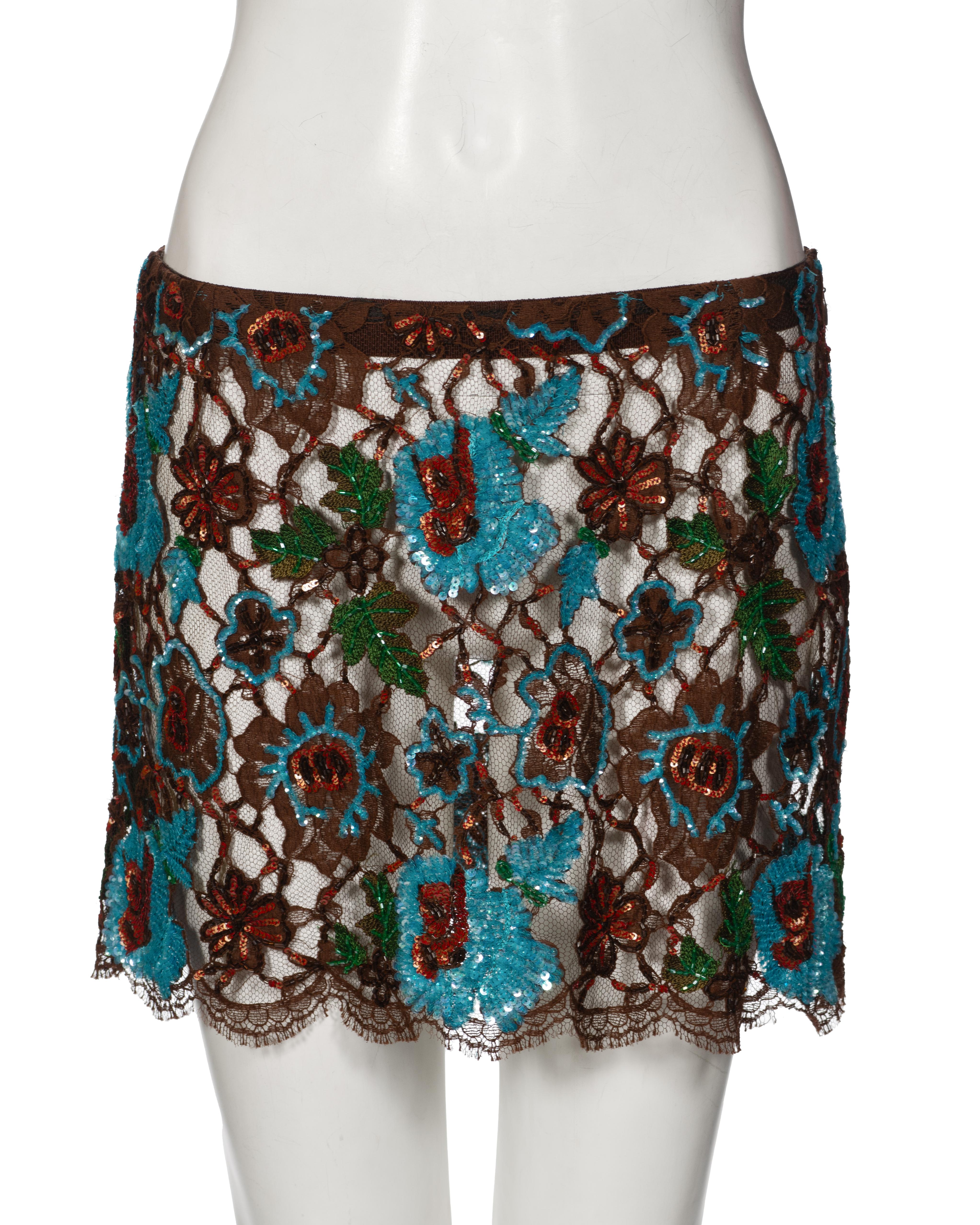 ▪ Dolce & Gabbana Embellished lace mini skirt
▪ Fall-Winter 1999
▪ Sold by One of a Kind Archive
▪ Intricate floral beadwork
▪ Sheer lace overlay
▪ Regular fit
▪ Material: 80% Cotton, 20% Nylon
▪ Colours: Brown, Blue, Red, Green
▪ Size: IT42 - FR38