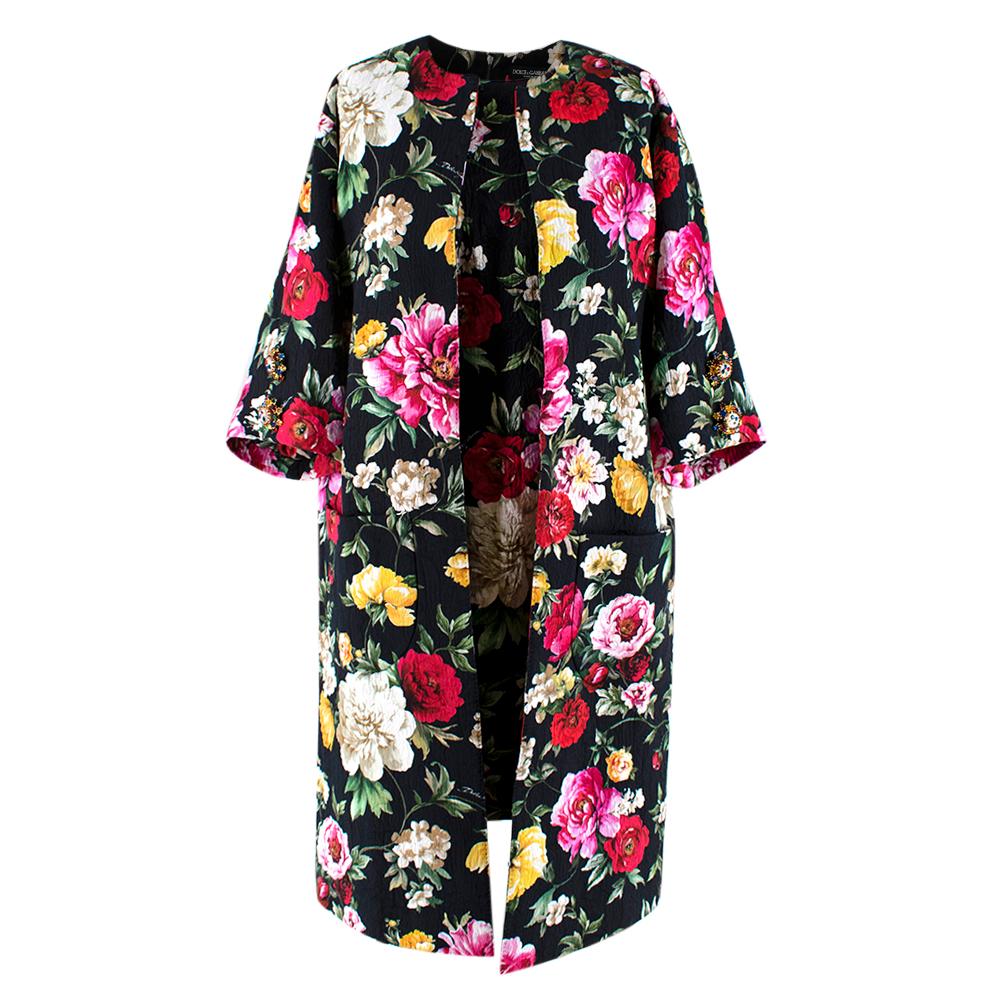 Dolce & Gabbana Floral Brocade Cocoon Coat & Sleeveless Dress

-Brocade sleeveless shift dress with matching coat
-Intricate black and Brocade floral patterned design
-Hidden zipper at the back of dress
-Two pockets on the coat
-Two floral Crystal