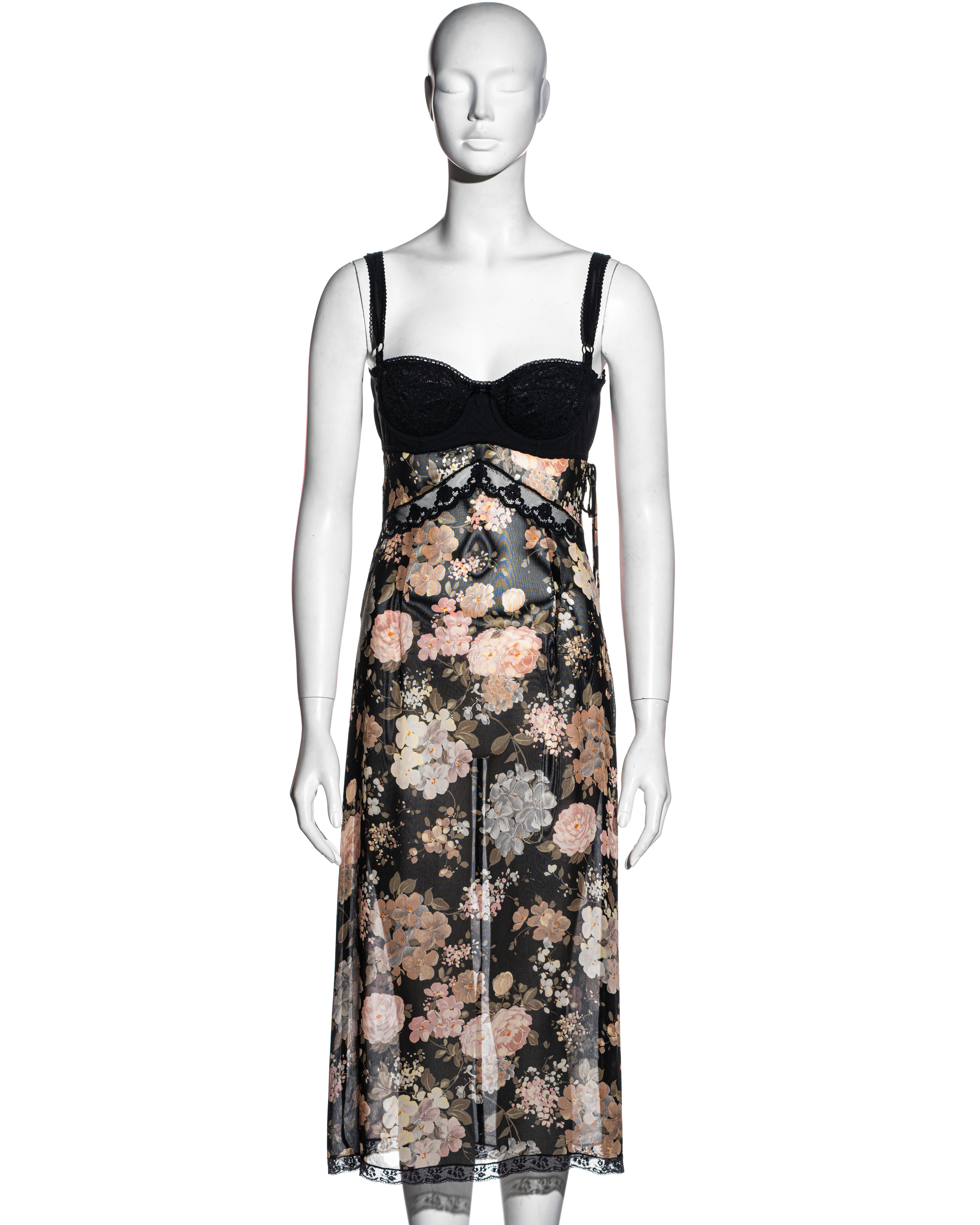 ▪ Dolce & Gabbana rayon chiffon evening slip dress
▪ Attached black bra with adjustable shoulder straps 
▪ Lace inserts and trim 
▪ Floral pattern with black base 
▪ Concealed zipper at the side seam with bow ribbon detail 
▪ IT 40 - FR 36 - UK 8
▪